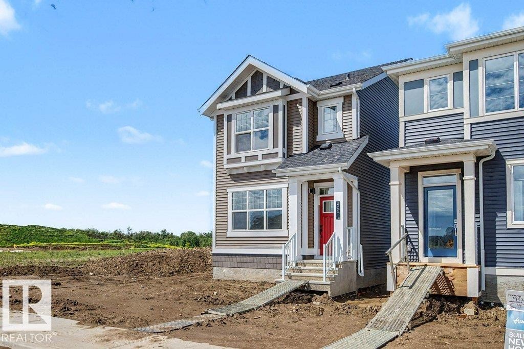 400 Stiles Way, Leduc, AB - Outdoor With Facade