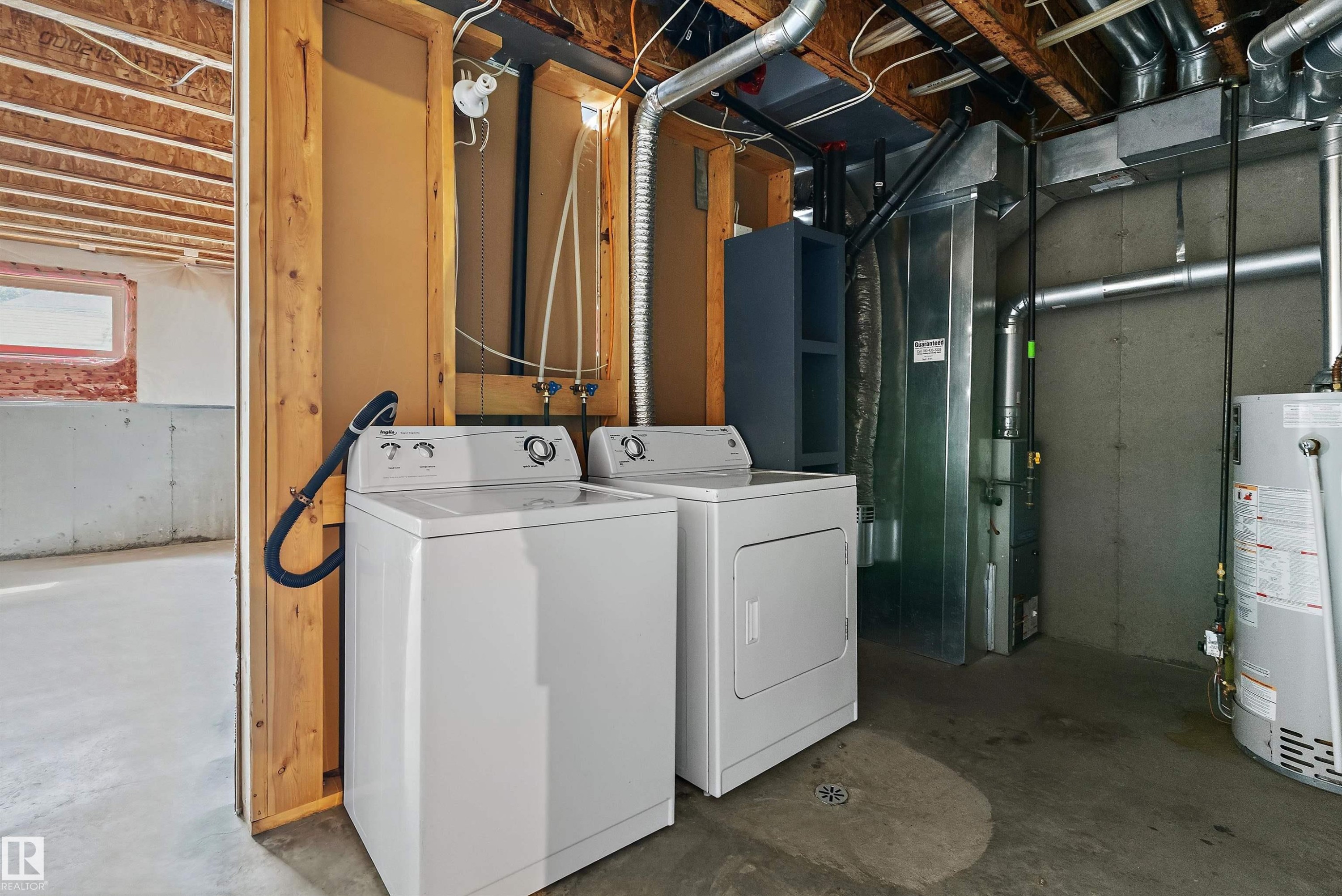 #56 130 Hyndman Cr Nw, Edmonton, AB - Indoor Photo Showing Laundry Room