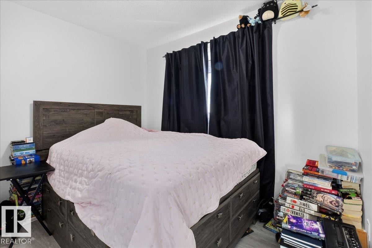 #1 11616 82 St Nw, Edmonton, AB - Indoor Photo Showing Bedroom