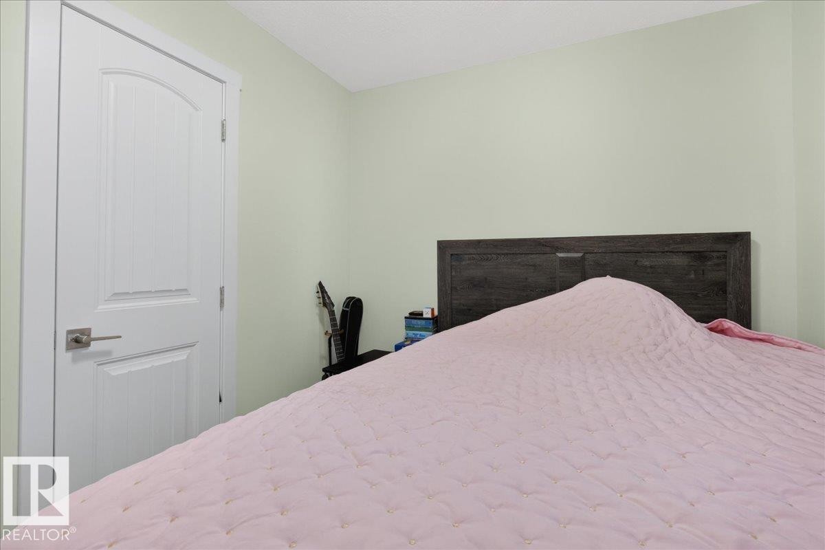 #1 11616 82 St Nw, Edmonton, AB - Indoor Photo Showing Bedroom
