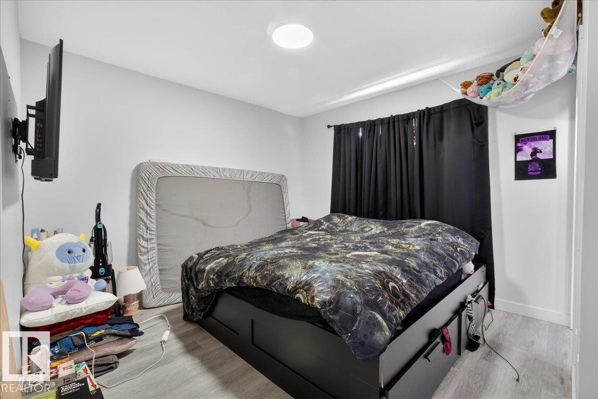 #1 11616 82 St Nw, Edmonton, AB - Indoor Photo Showing Bedroom
