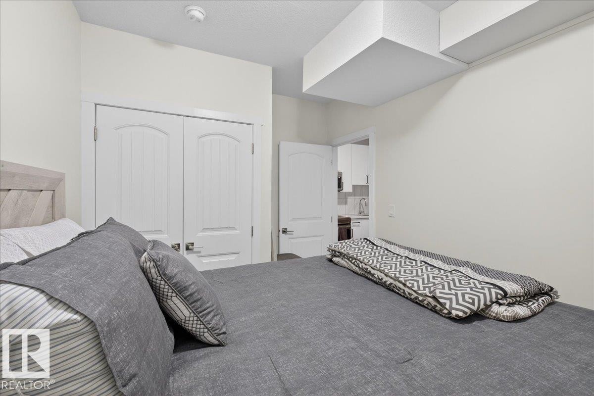#1 11616 82 St Nw, Edmonton, AB - Indoor Photo Showing Bedroom