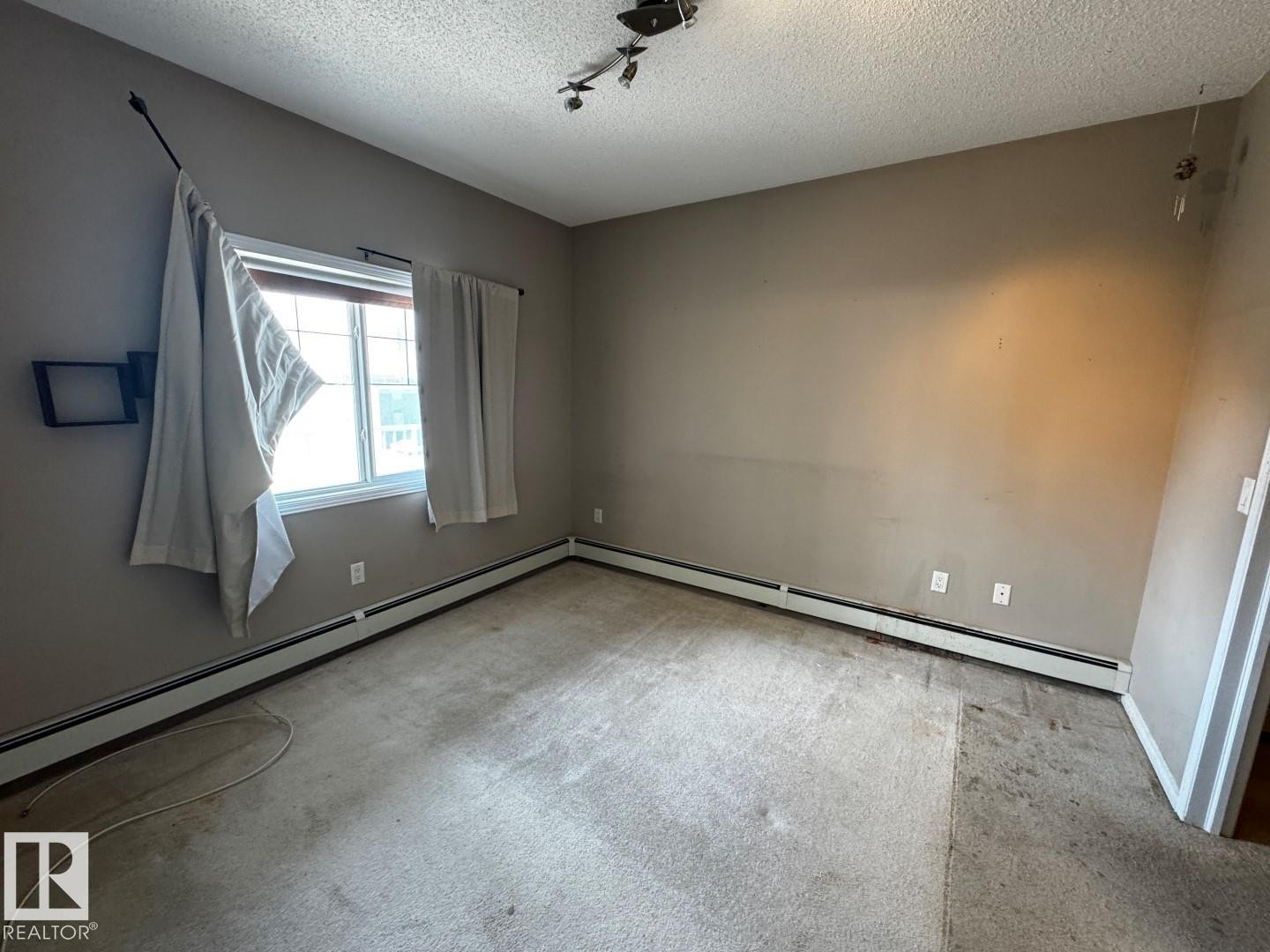 300 16715 100 Avenue, Edmonton, AB - Indoor Photo Showing Other Room