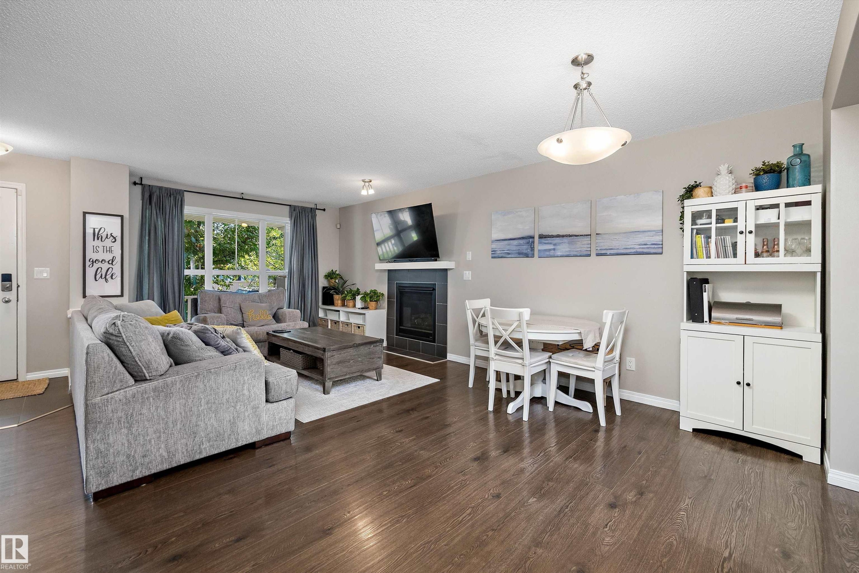 1922 74 Street Sw, Edmonton, AB - Indoor Photo Showing Living Room With Fireplace