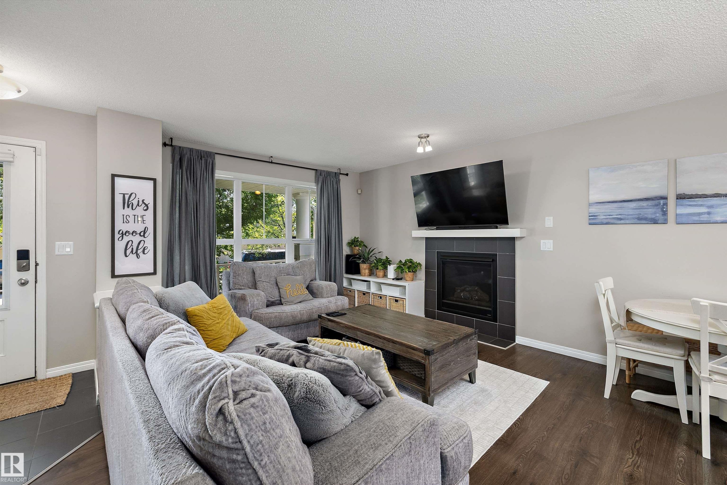 1922 74 Street Sw, Edmonton, AB - Indoor Photo Showing Living Room With Fireplace