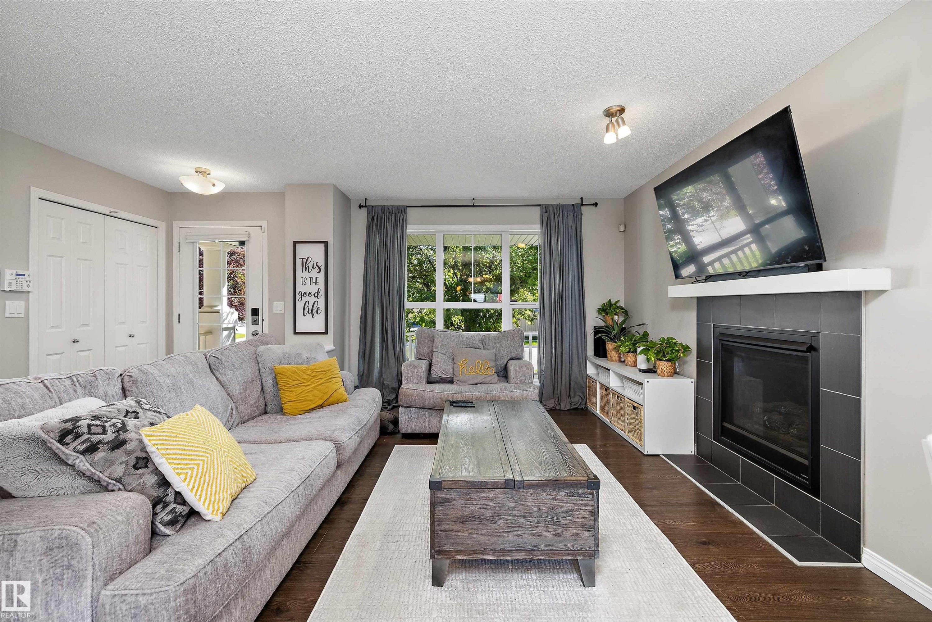 1922 74 Street Sw, Edmonton, AB - Indoor Photo Showing Living Room With Fireplace