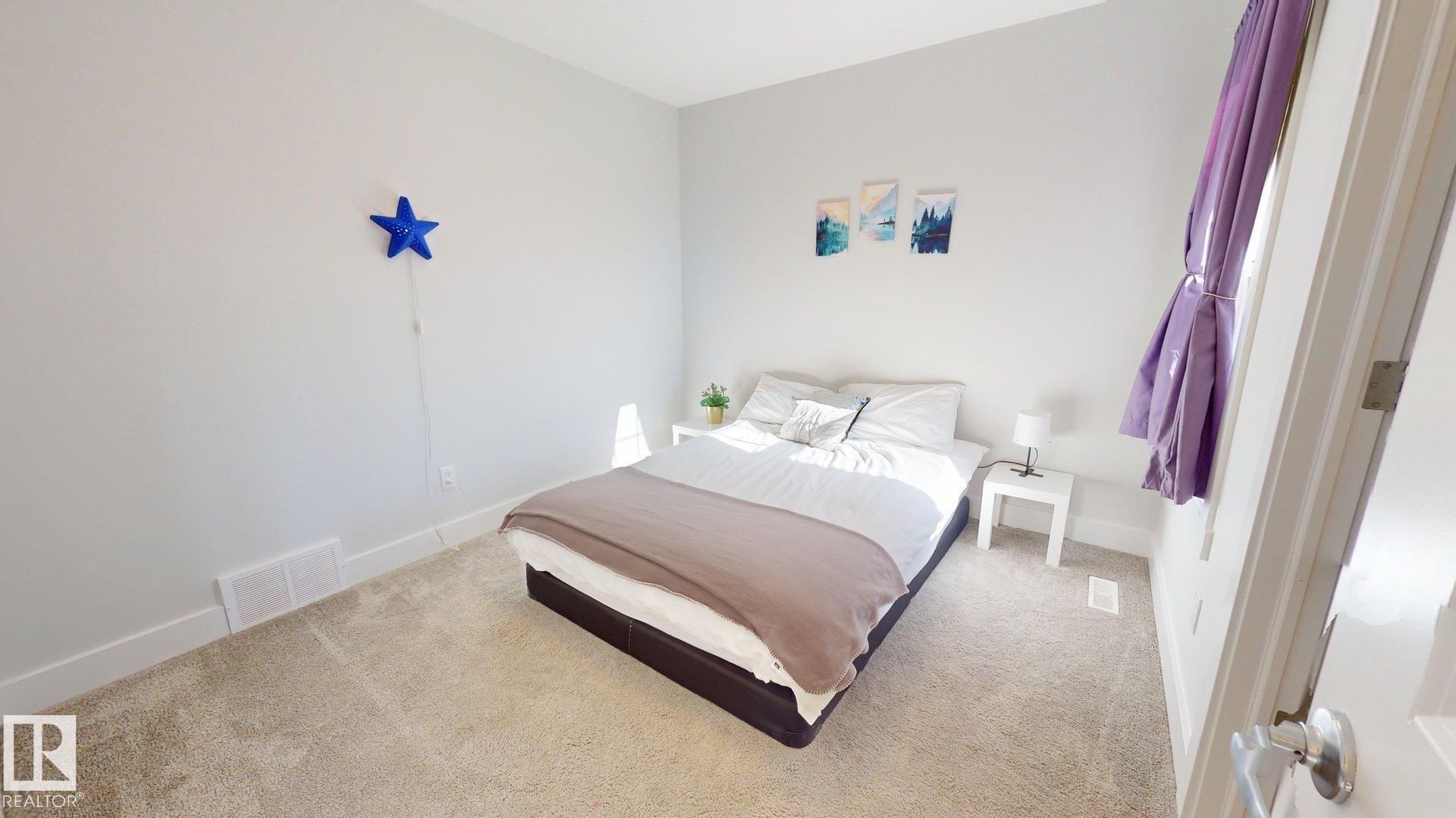 3805 Cherry Loop Sw, Edmonton, AB - Indoor Photo Showing Bedroom