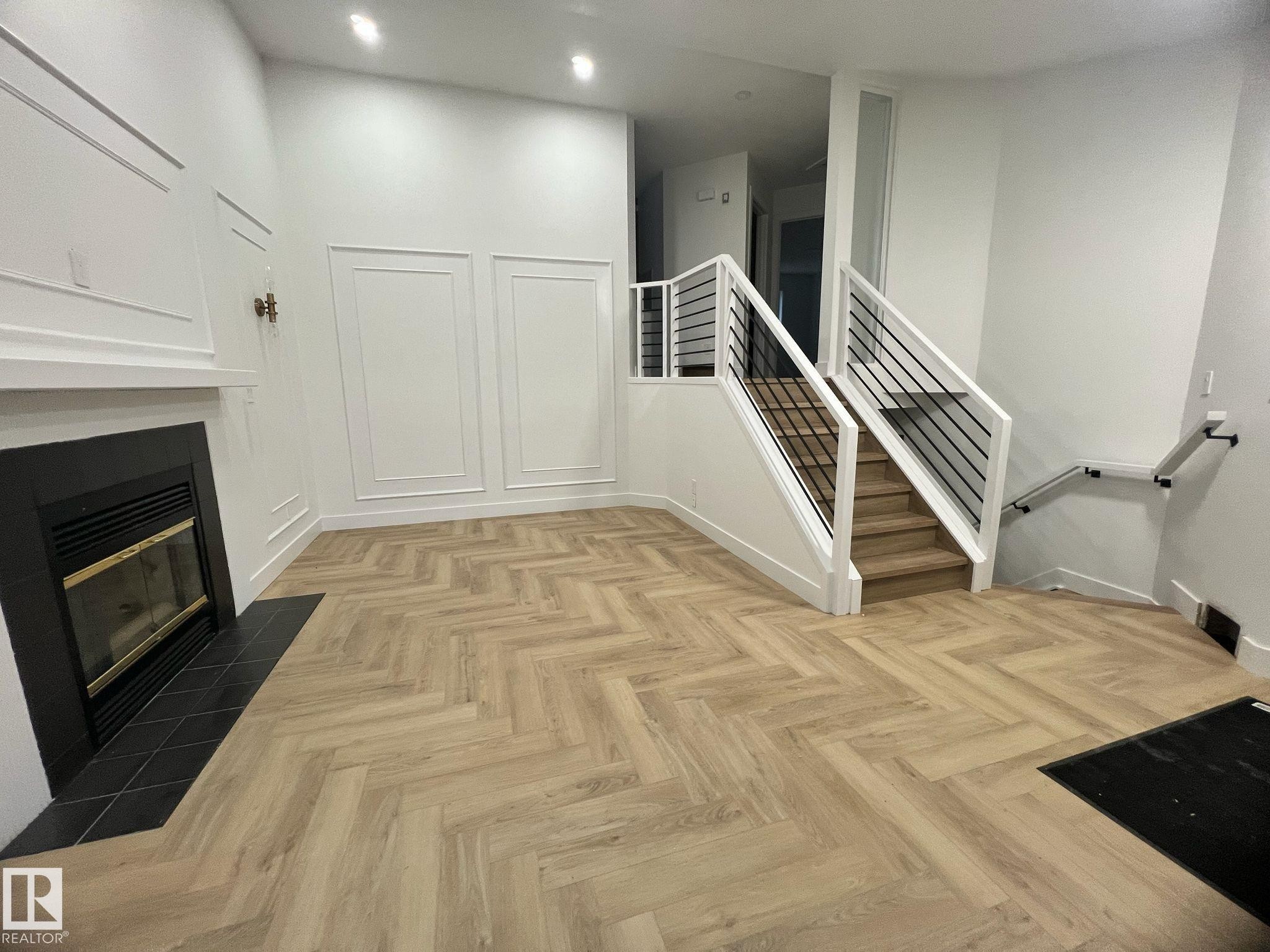 Herringbone wood-finish flooring - 3320 43 Street, Edmonton, AB