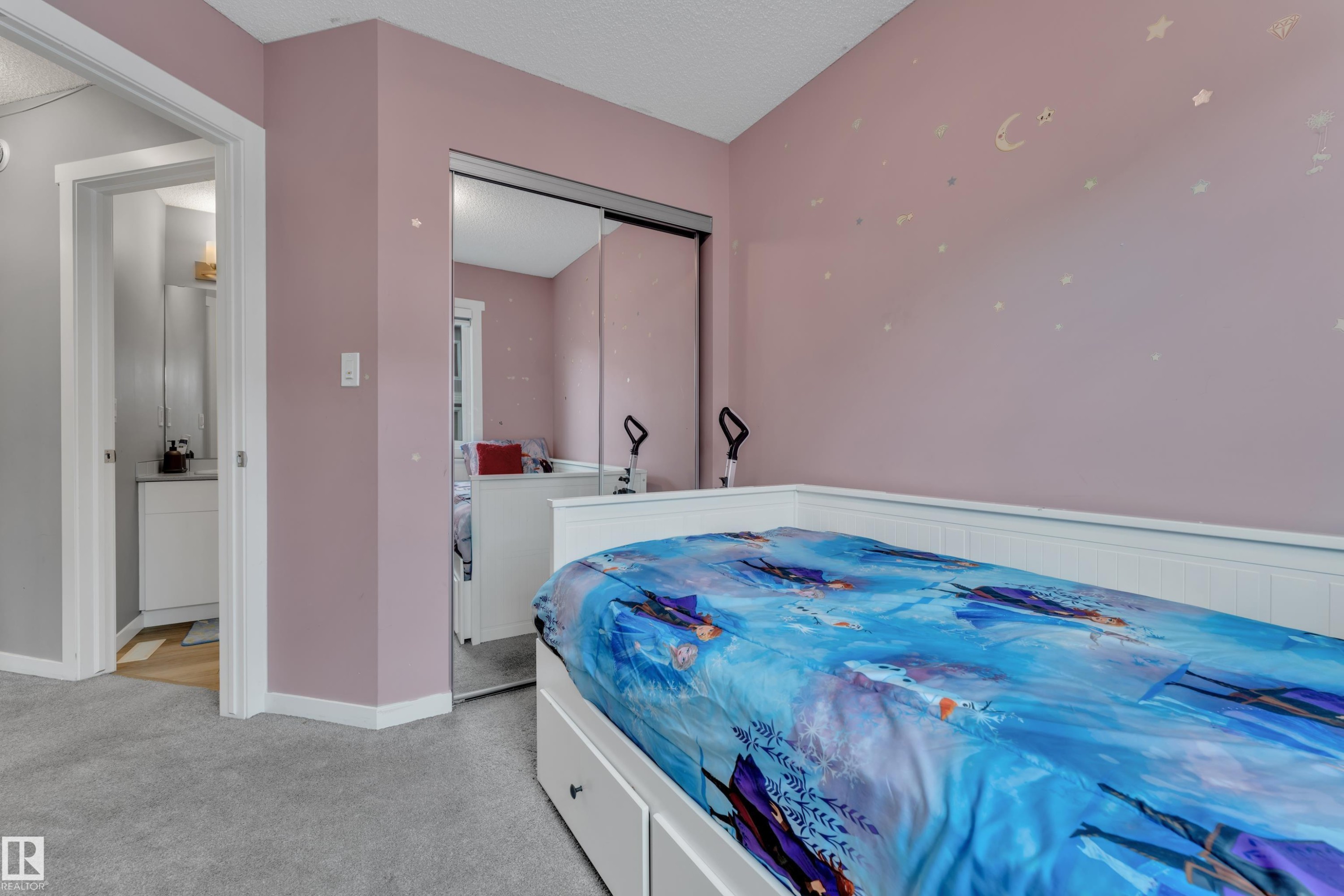 Room featuring light pink walls and gray carpet flooring - #82 1816 Rutherford Rd Sw, Edmonton, AB - Indoor Photo Showing Bedroom