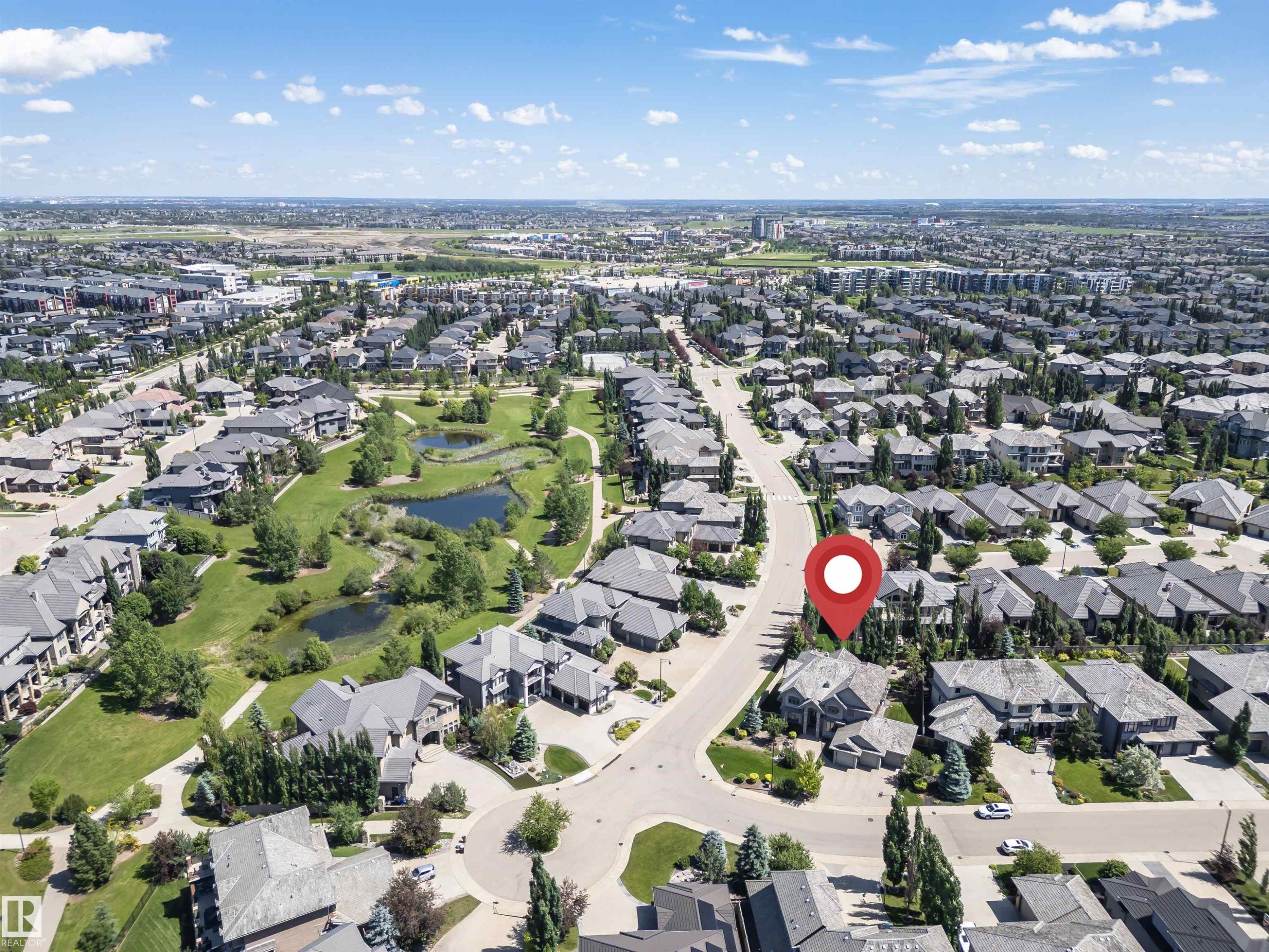 Aerial perspective showcasing a residential neighborhood with varied architectural styles - 3503 Watson Point(E), Edmonton, AB