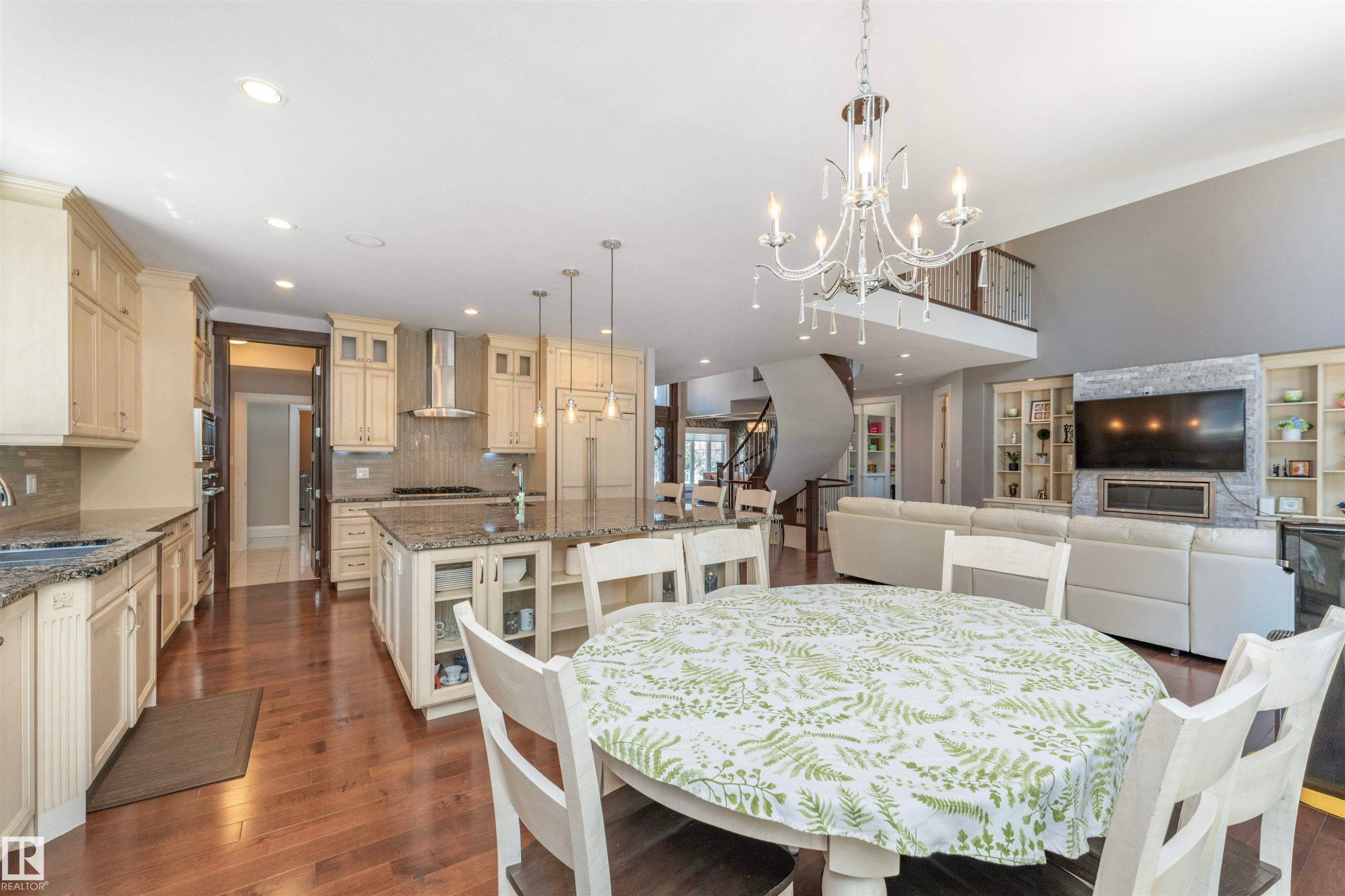 Open-concept living space with wood-finish flooring - 3503 Watson Point(E), Edmonton, AB
