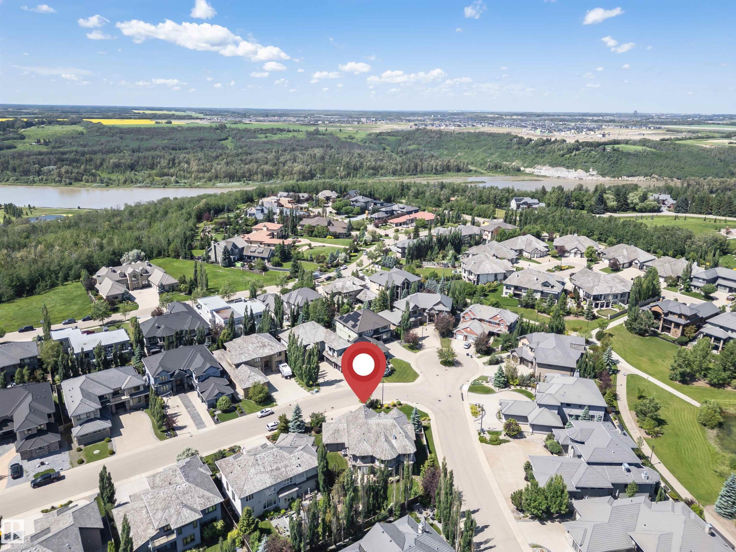 Aerial view of a residential neighborhood with varied architectural styles and mature landscaping - 3503 Watson Point(E), Edmonton, AB