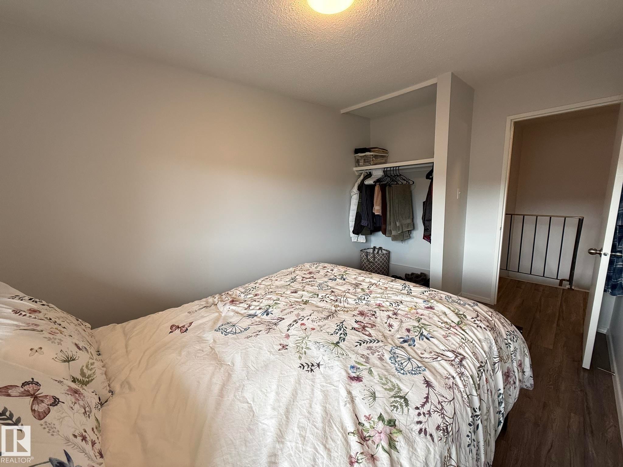 2nd UPPER FLOOR BEDROOM WITH VINYL PLANK FLOORING! - 166 Roseland Village, Edmonton, AB - Indoor Photo Showing Bedroom