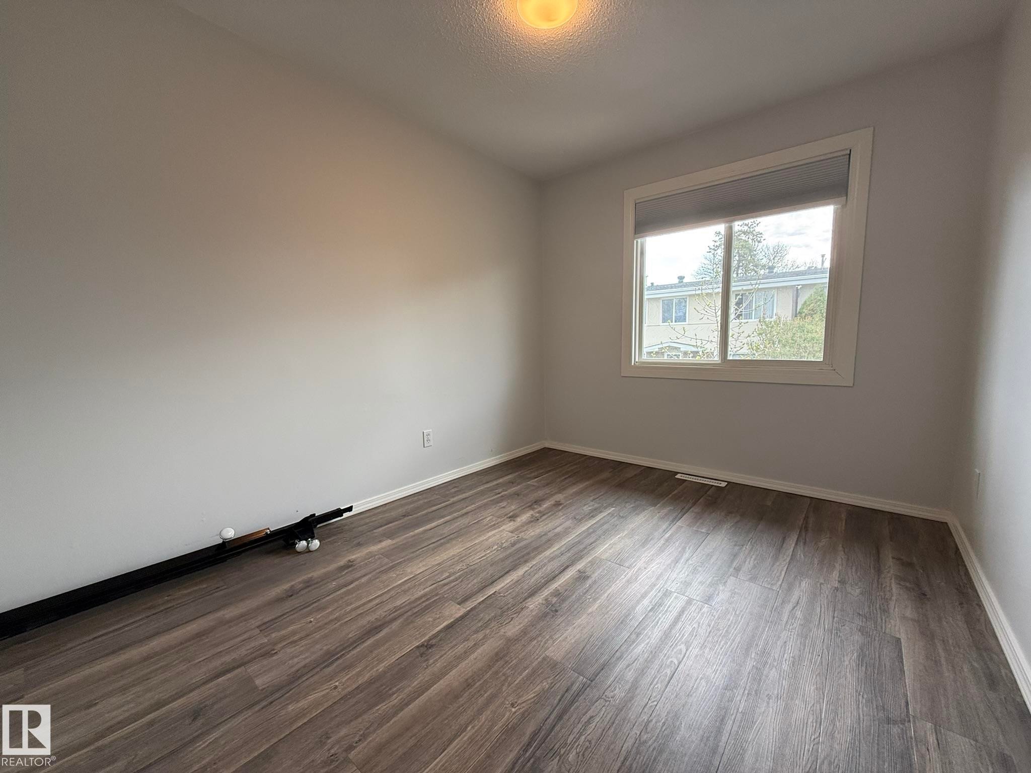 3rd UPPER FLOOR BEDROOM WITH VINYL PLANK FLOORING TOO! - 166 Roseland Village, Edmonton, AB - Indoor Photo Showing Other Room