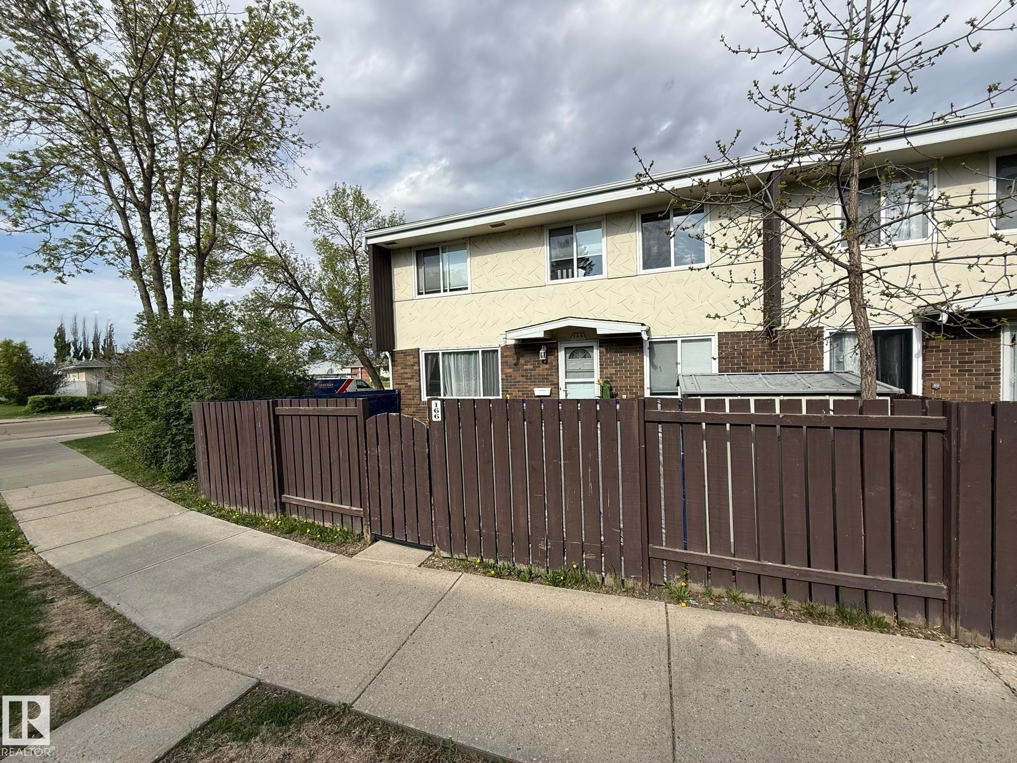 ANOTHER GREAT PHOTO OF YOUR END #166 UNIT THAT YOU CAN SEE YOUR STREET PARKING ON 140 AVE. NW! - 166 Roseland Village, Edmonton, AB - Outdoor