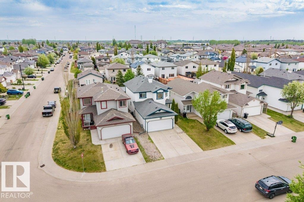 Residential neighborhood featuring single-family homes with attached garages - 3525 22 Street, Edmonton, AB - Outdoor With View