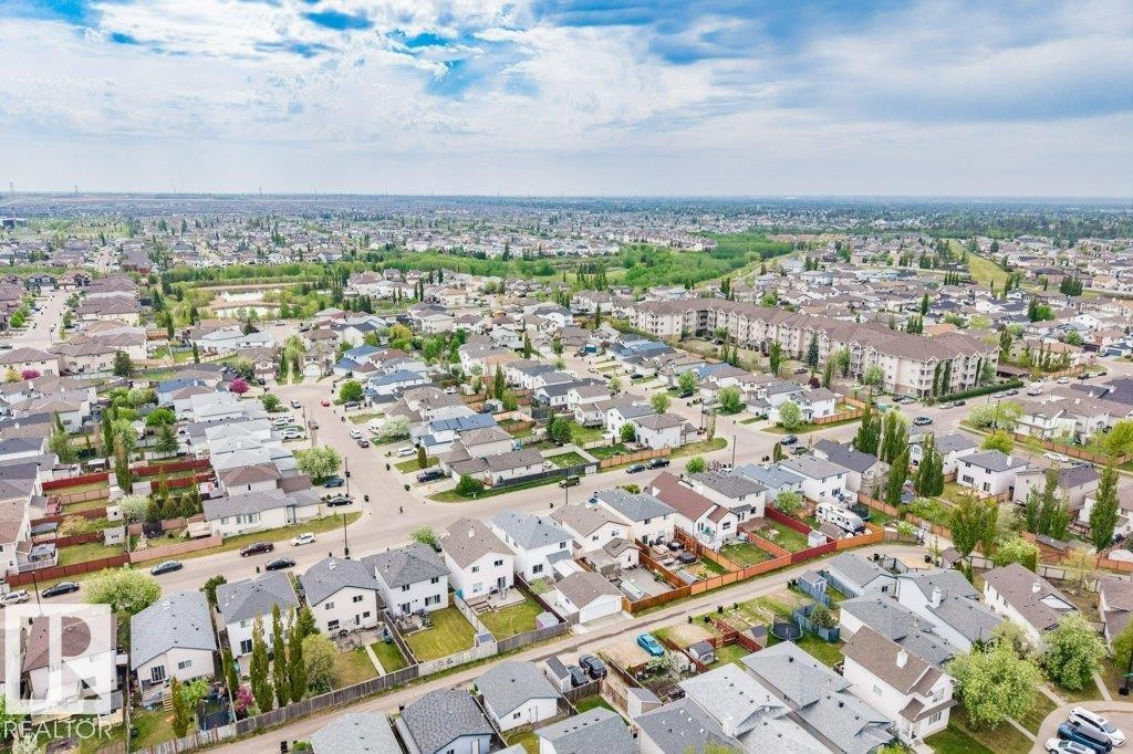 Aerial perspective showcasing a residential area with varied housing styles - 3525 22 Street, Edmonton, AB - Outdoor With View
