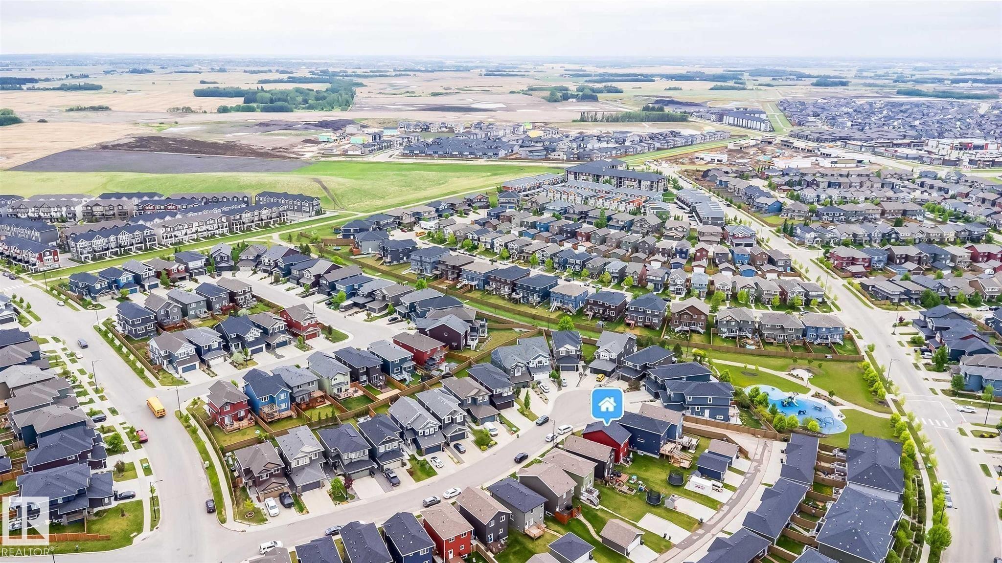 Aerial perspective showcasing a residential development with varied architectural styles - 2424 Wonnacott Court, Edmonton, AB