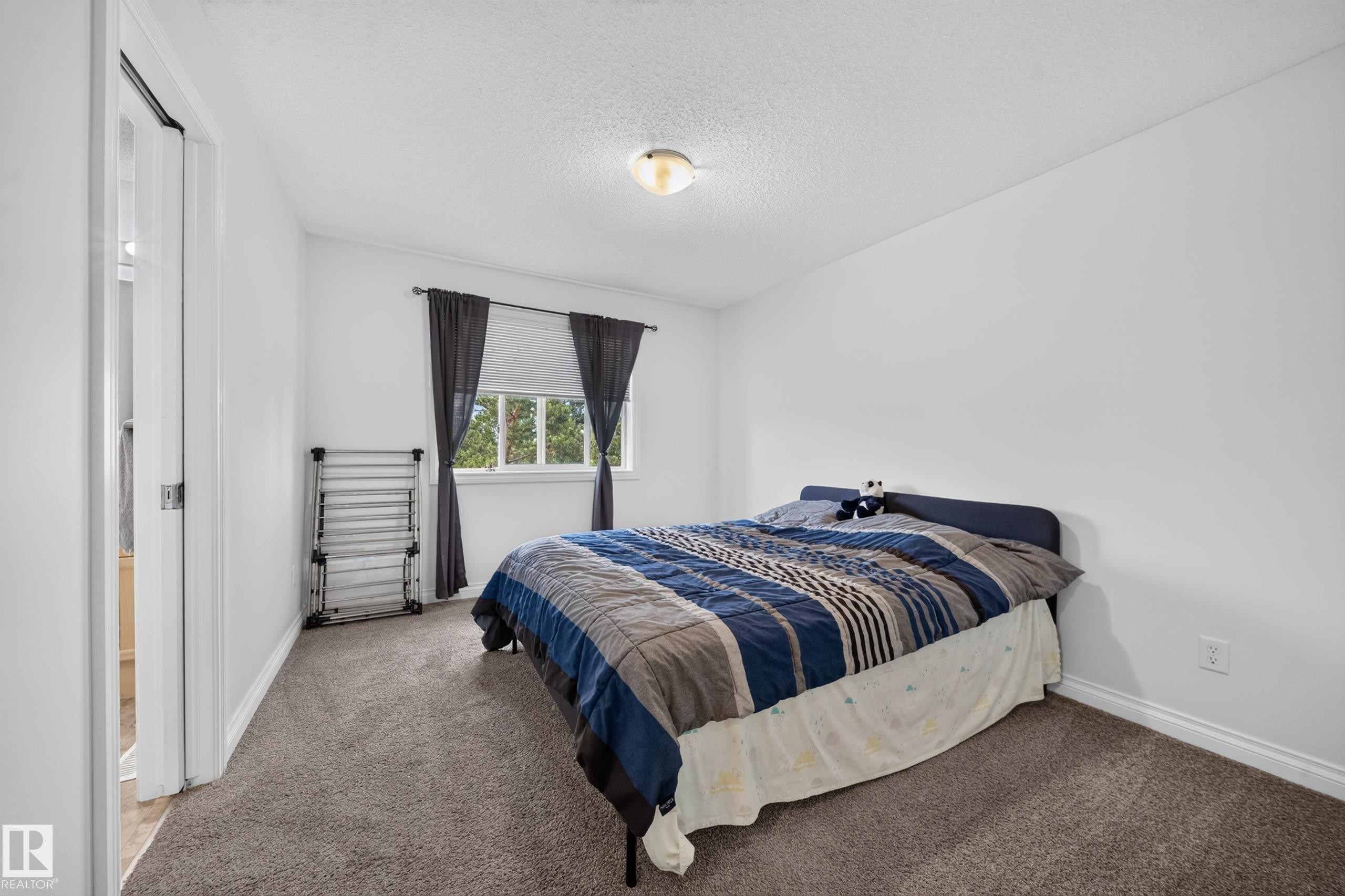 #32 12050 17 Av Sw, Edmonton, AB - Indoor Photo Showing Bedroom