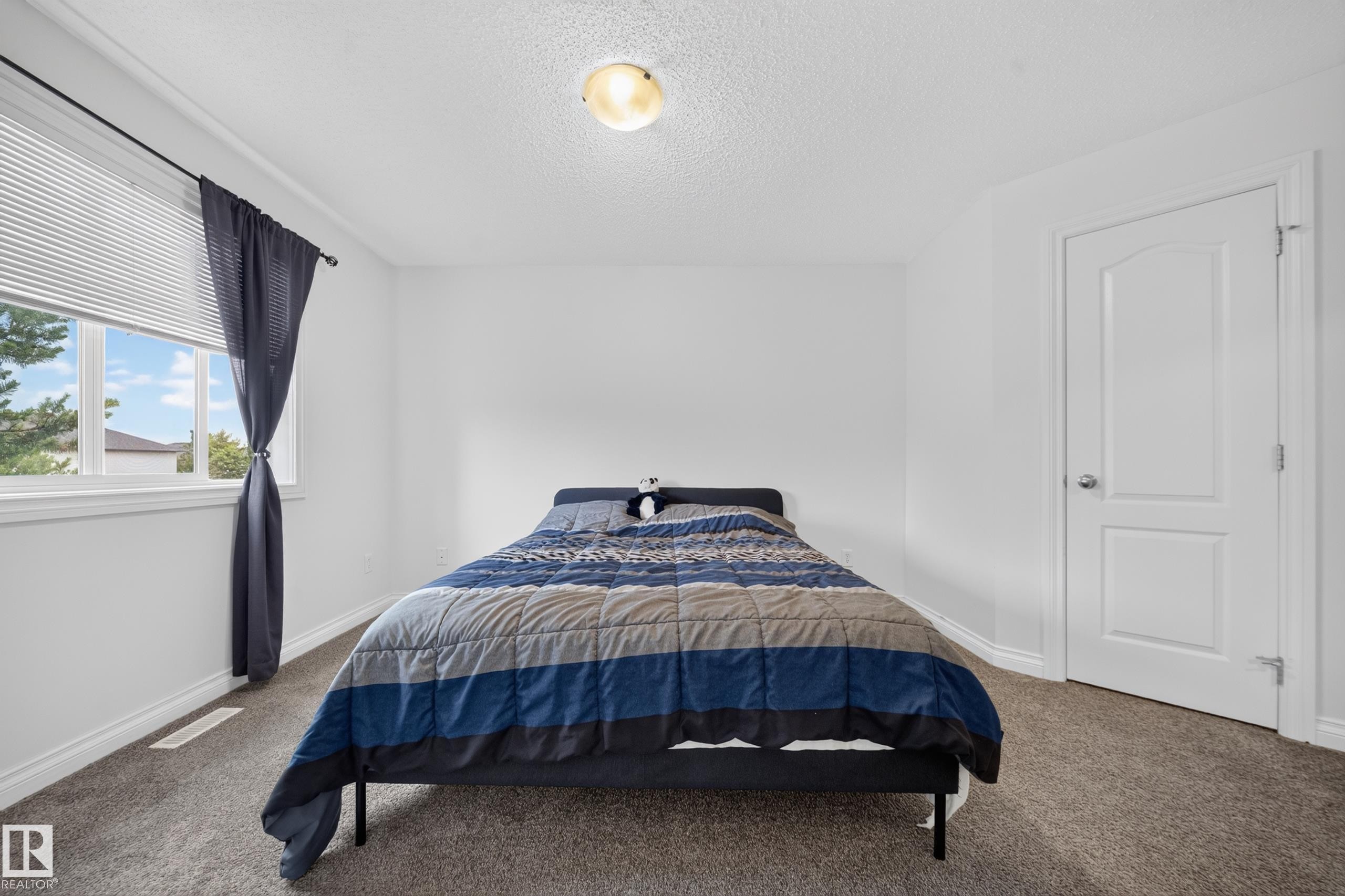 #32 12050 17 Av Sw, Edmonton, AB - Indoor Photo Showing Bedroom