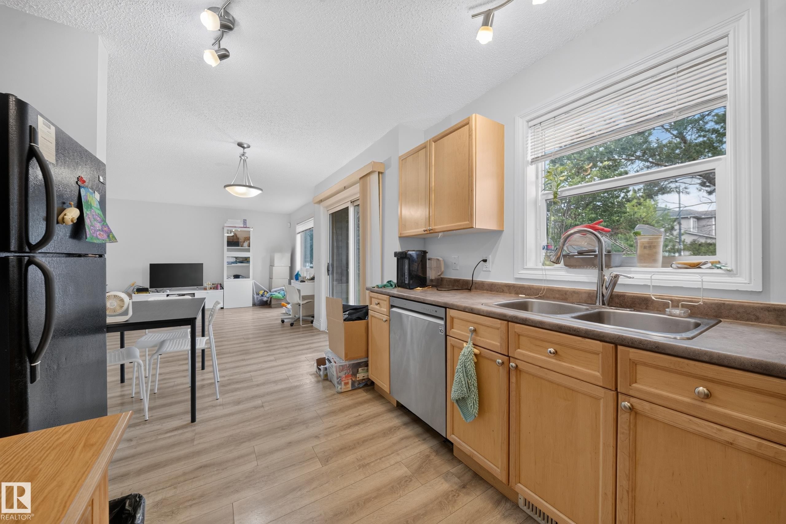 #32 12050 17 Av Sw, Edmonton, AB - Indoor Photo Showing Kitchen With Double Sink