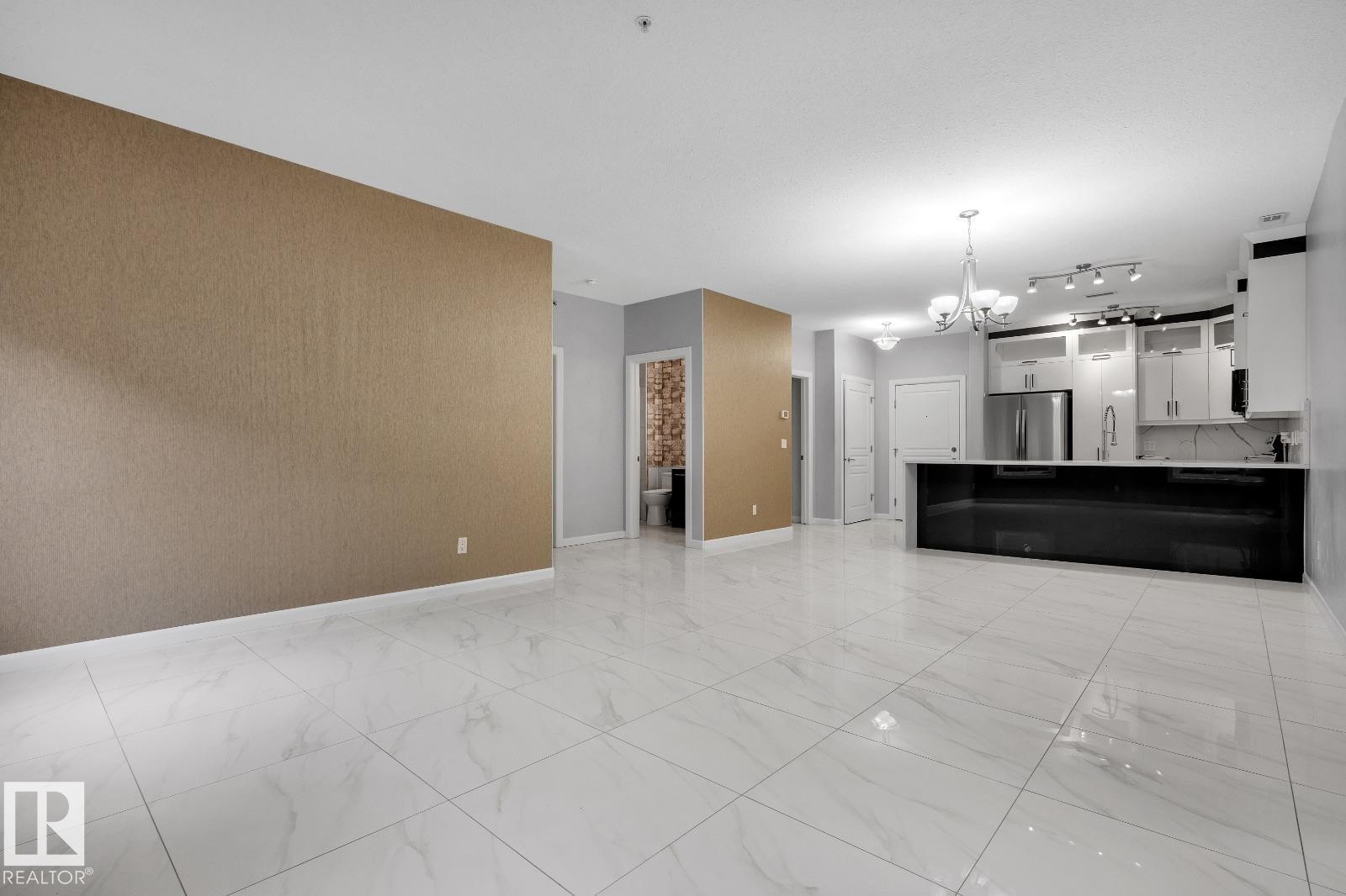 Living room - 105 160 Magrath Road, Edmonton, AB