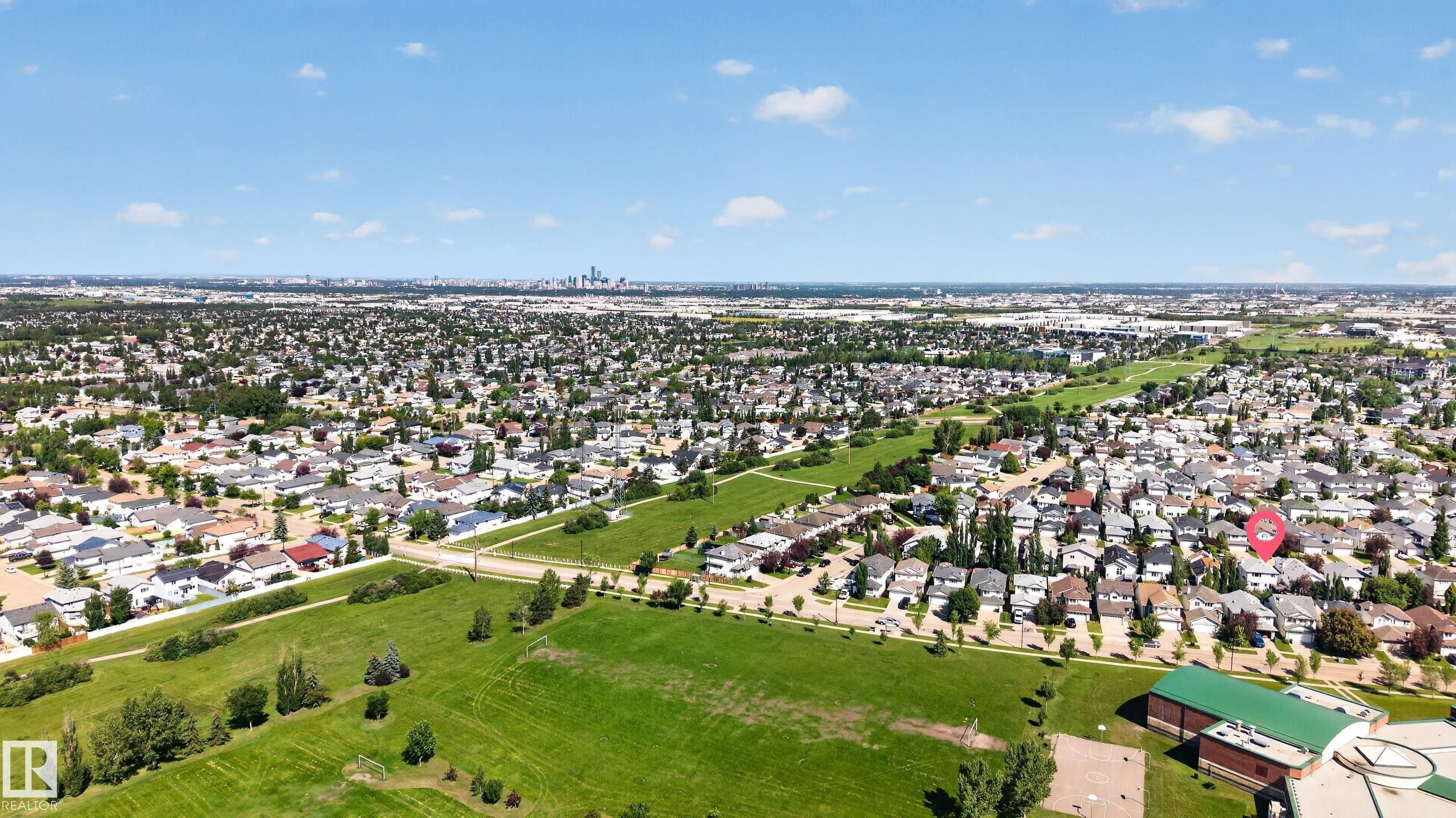 Expansive aerial view showcasing a residential area with green spaces - 2327 37B Avenue, Edmonton, AB
