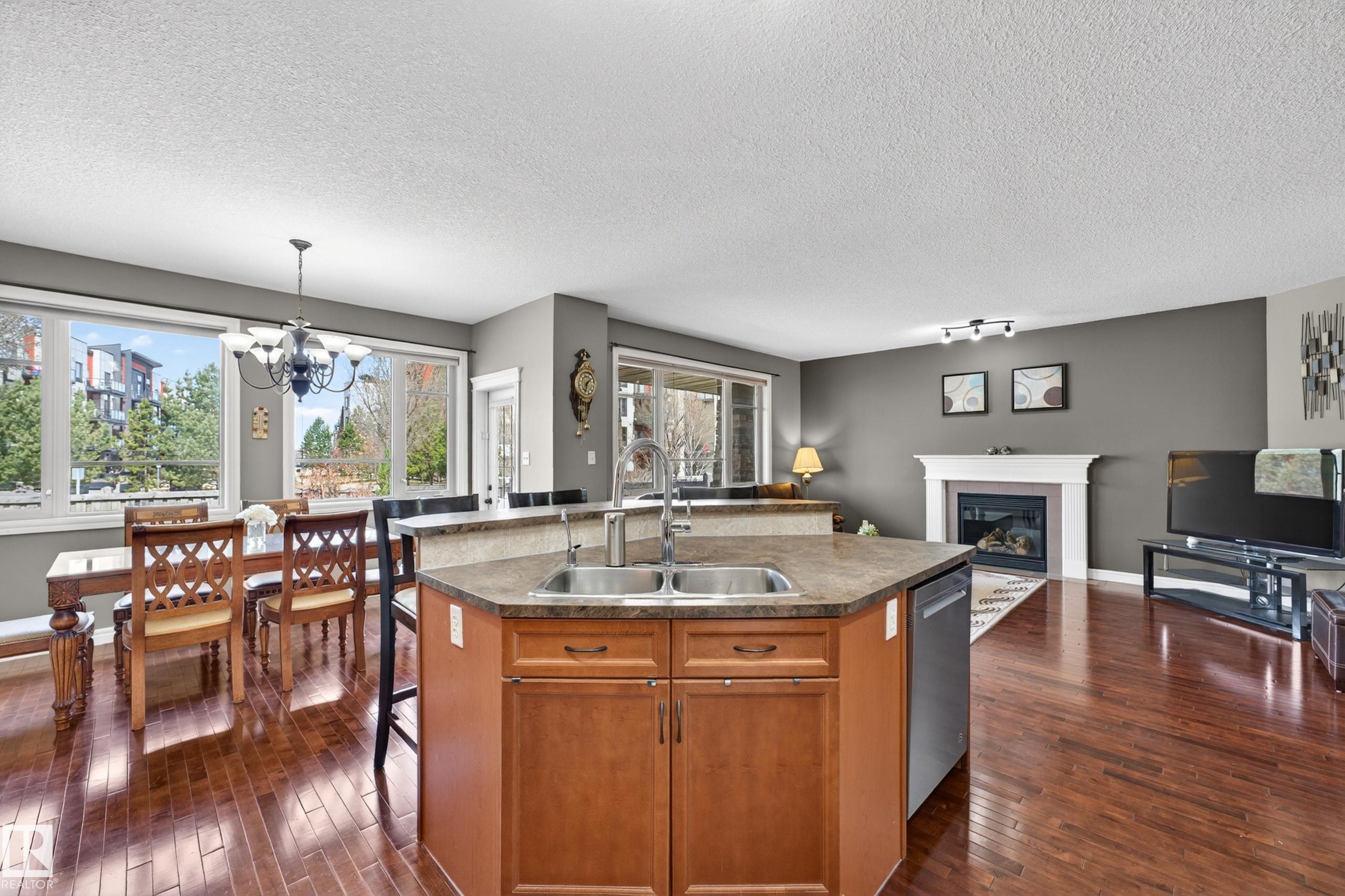 506 Adams Way Sw, Edmonton, AB - Indoor Photo Showing Other Room With Fireplace