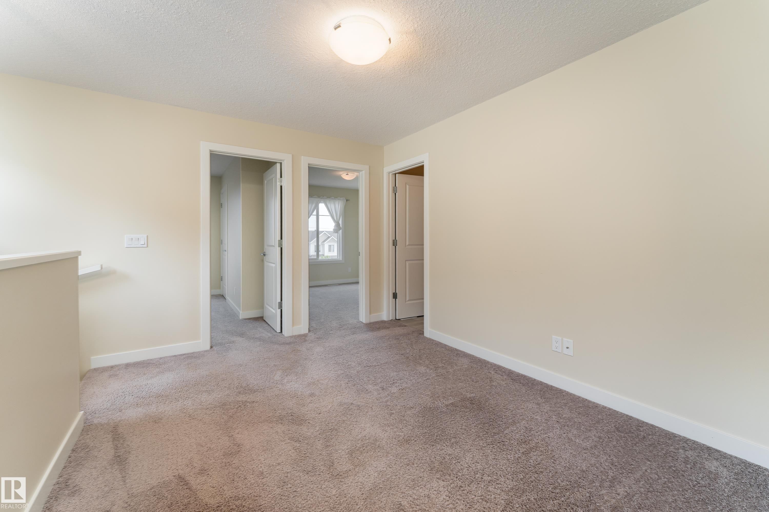 Empty room - 8589 Cushing Place Sw, Edmonton, AB - Indoor Photo Showing Other Room