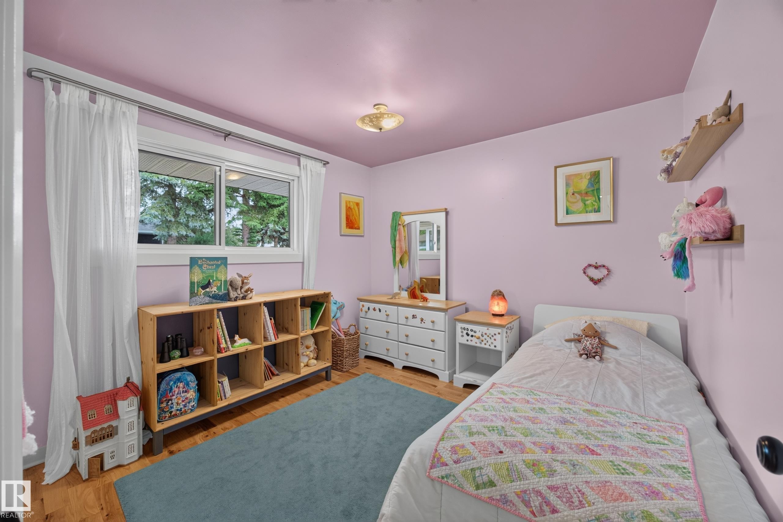 Hardwood-style flooring with a light wood finish - 3411 103 Avenue Nw, Edmonton, AB