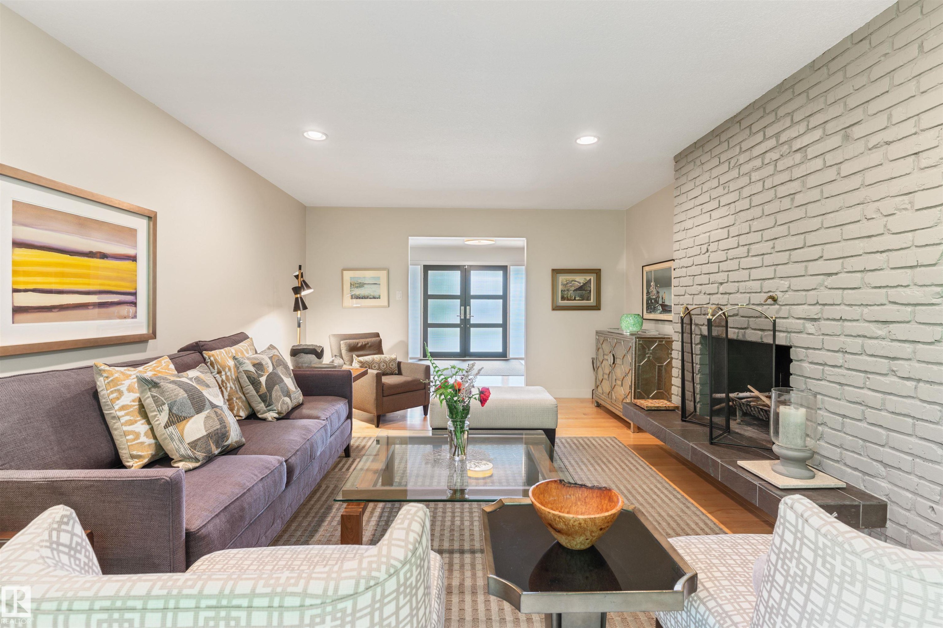 16 Quesnell Road Nw, Edmonton, AB - Indoor Photo Showing Living Room With Fireplace
