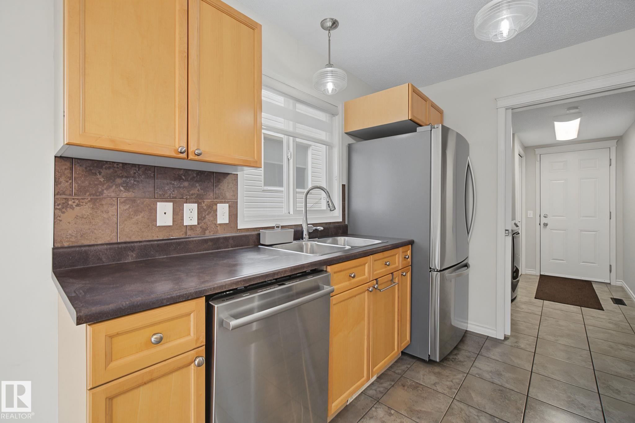616 61 Street Sw, Edmonton, AB - Indoor Photo Showing Kitchen With Double Sink