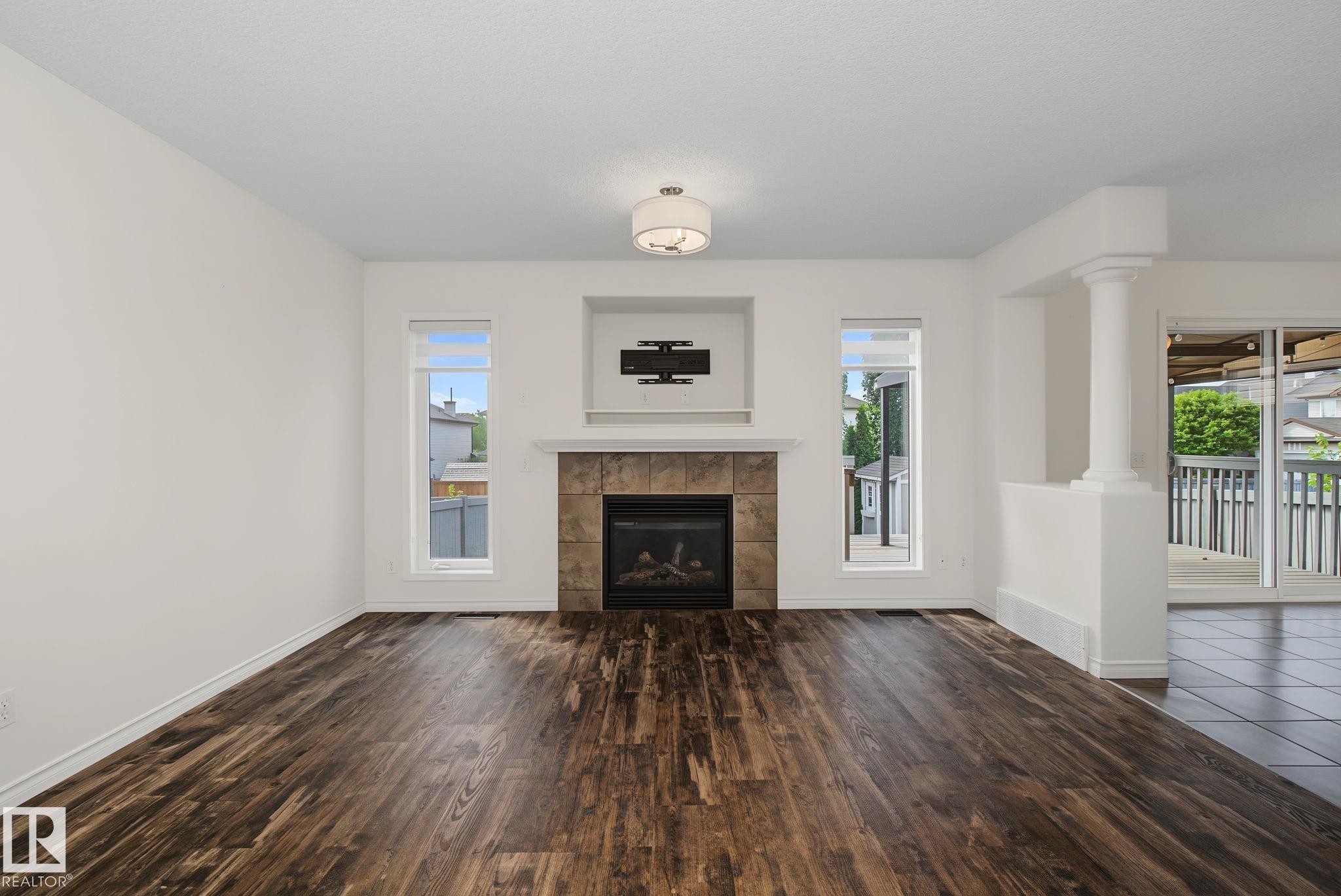 616 61 Street Sw, Edmonton, AB - Indoor Photo Showing Living Room With Fireplace