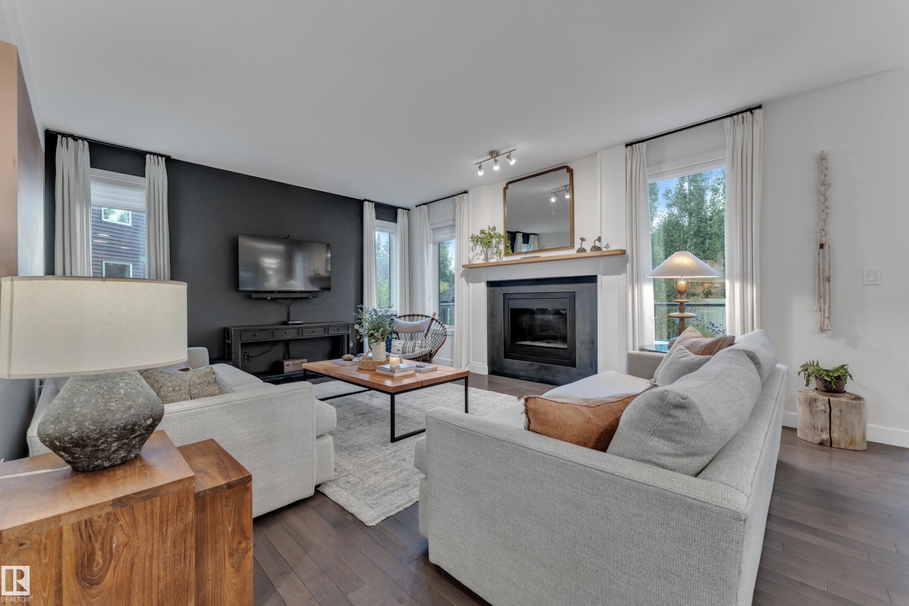 3722 Kidd Crescent Sw, Edmonton, AB - Indoor Photo Showing Living Room With Fireplace