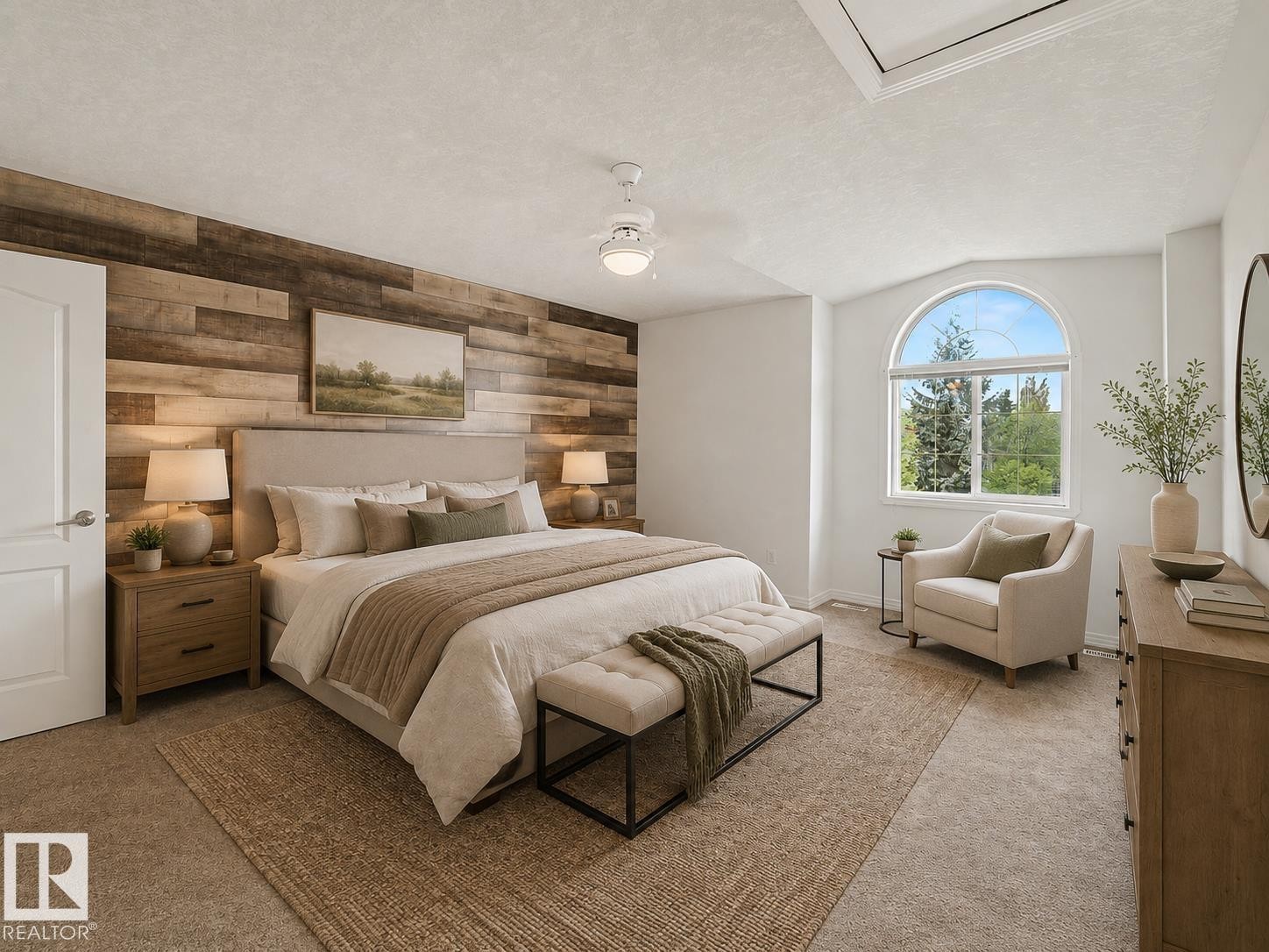Spacious bedroom featuring an accent wall with varied wood paneling, an arched window, and vaulted ceilings - 1619 Welbourn Cove, Edmonton, AB