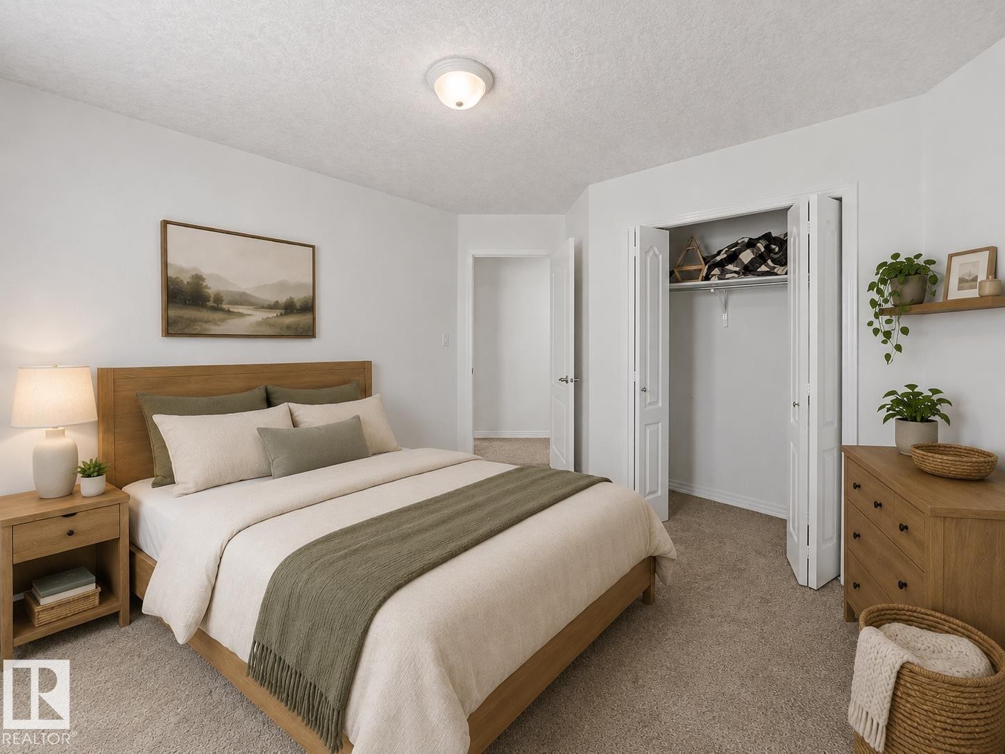 Carpeted bedroom featuring a light wood-finish bed frame, a built-in bi-fold door closet, a single ceiling light fixture, and white painted walls - 1619 Welbourn Cove, Edmonton, AB