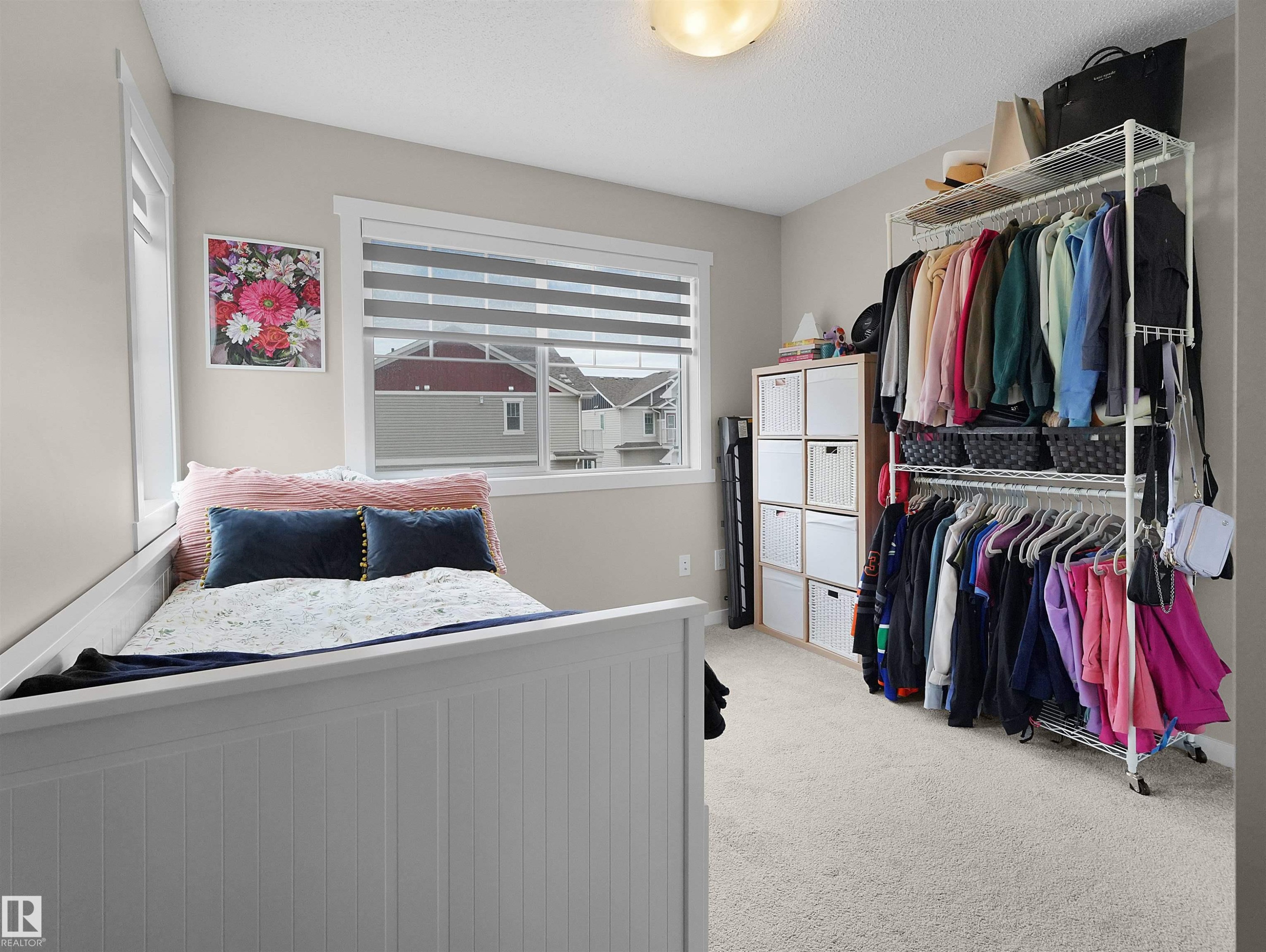 Light-toned walls with contrasting white trim, featuring a recessed window with blinds - #49 17832 78 St Nw, Edmonton, AB - Indoor