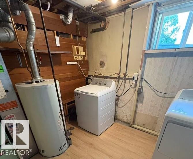 Utility area with a water heater, washer, and dryer - 9606 163 Street Nw, Edmonton, AB
