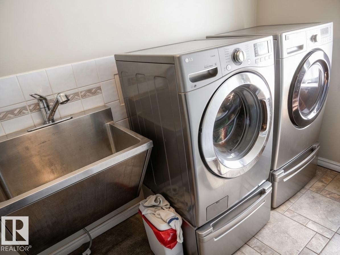 #9 Pinebrook Estates, Rural Thorhild County, AB - Indoor Photo Showing Laundry Room