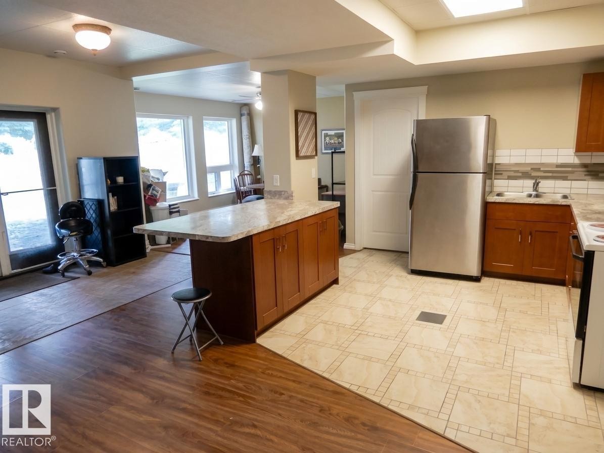 #9 Pinebrook Estates, Rural Thorhild County, AB - Indoor Photo Showing Kitchen With Double Sink