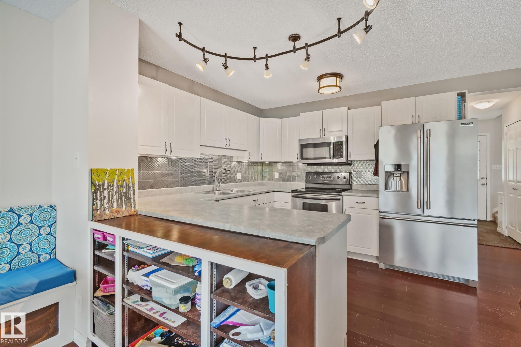12248 16 Avenue Sw, Edmonton, AB - Indoor Photo Showing Kitchen With Double Sink