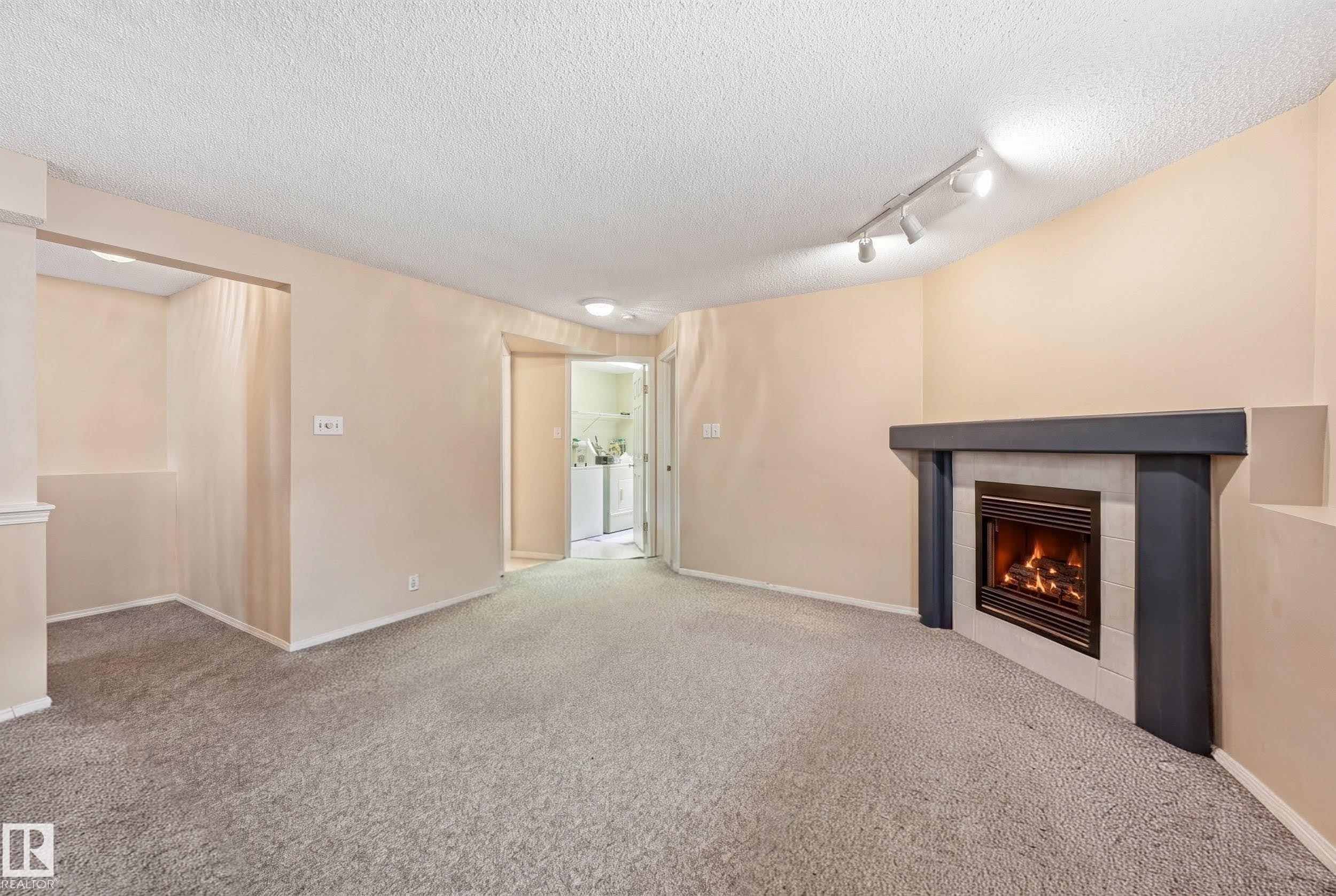 2050 Tanner Wynd Nw, Edmonton, AB - Indoor With Fireplace