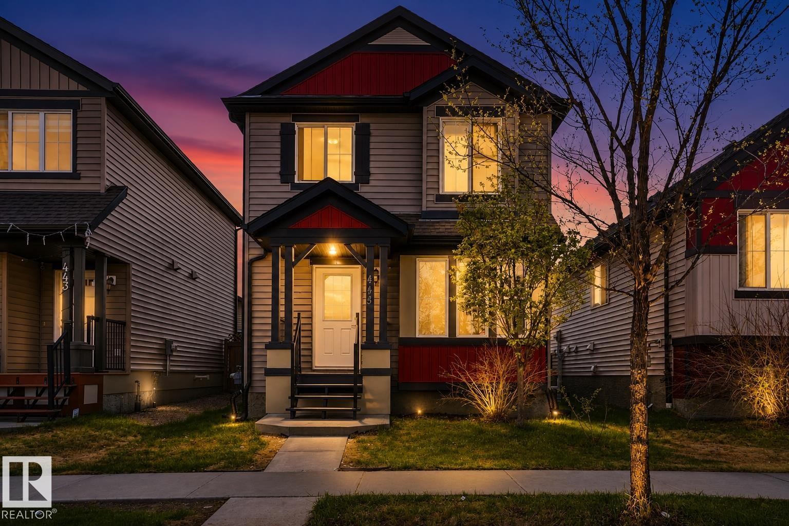 Two-story property featuring horizontal siding and dark trim accents - 445 Watt Boulevard Sw, Edmonton, AB - Outdoor