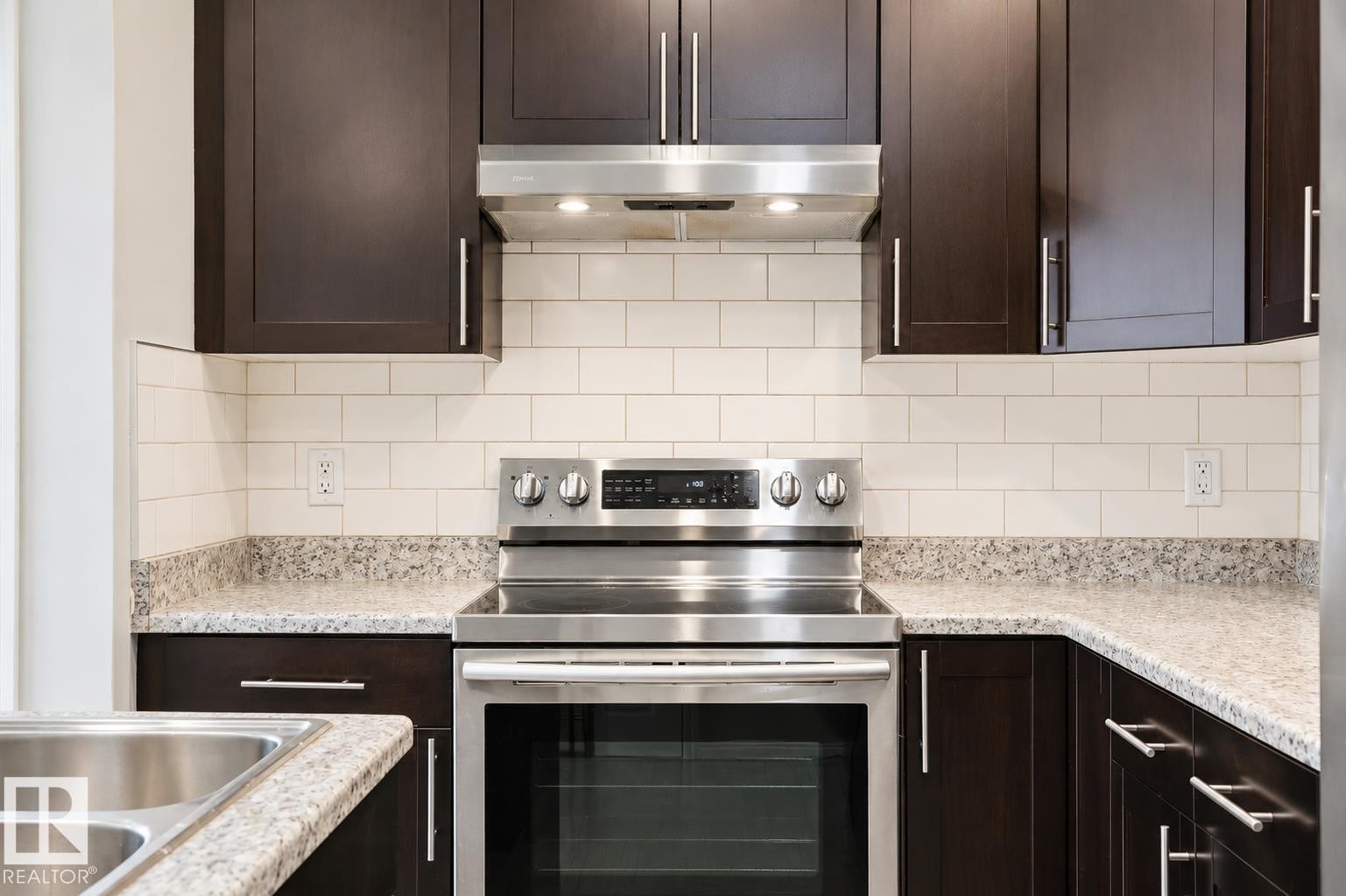Stainless steel range and hood with subway tile backsplash - 445 Watt Boulevard Sw, Edmonton, AB - Indoor Photo Showing Kitchen With Upgraded Kitchen