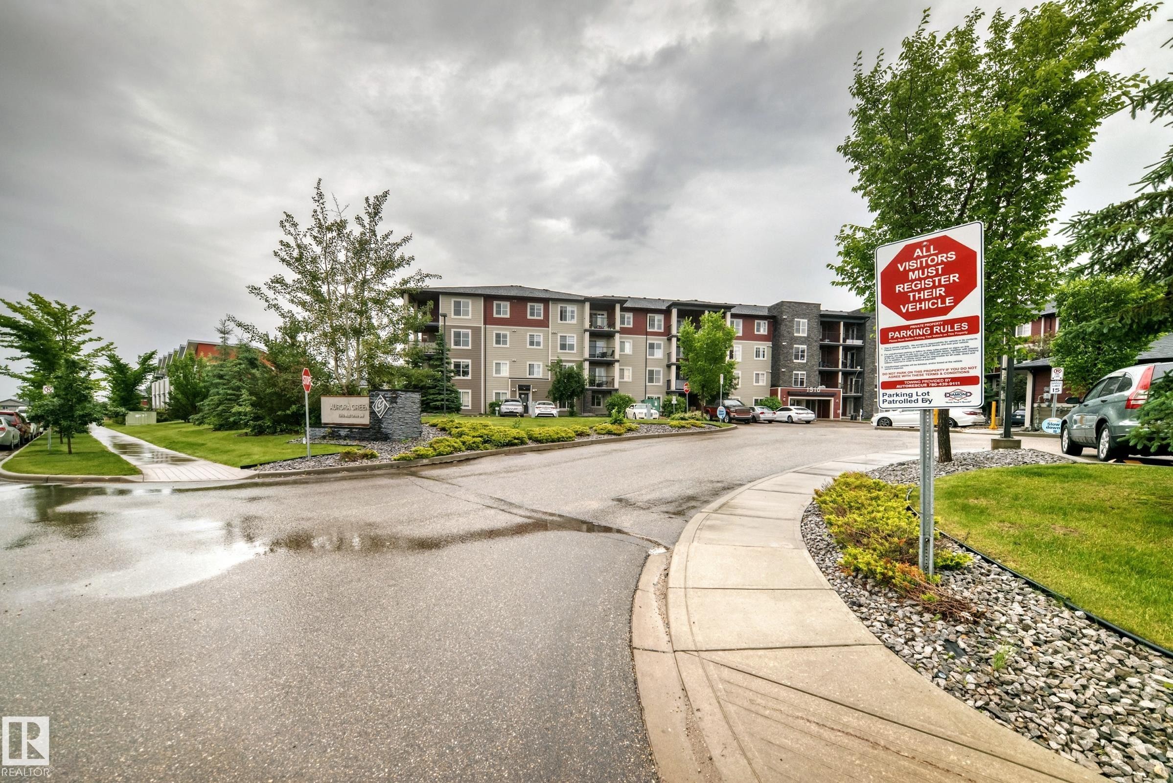 Multi-story residential building featuring a multi-tone exterior with balconies - #417 1510 Watt Dr Sw, Edmonton, AB - Outdoor