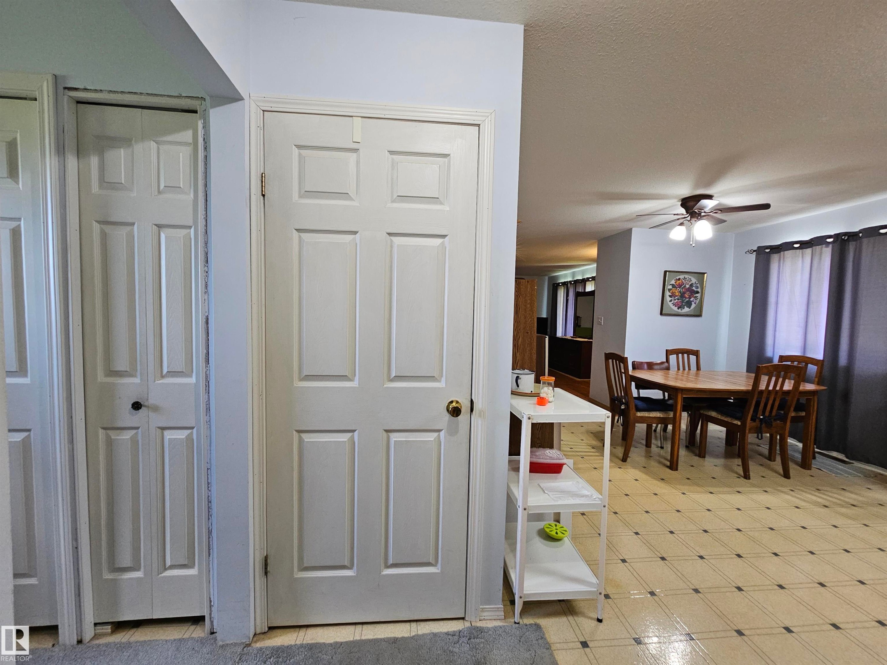 View to basement steps, laundry to left, photo from side door entrance to kitchen - 57415 Range Road 93, Rural St. Paul County, AB - Indoor Photo Showing Other Room