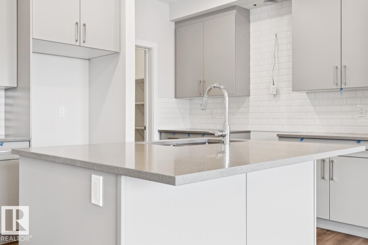 2482 Egret Loop Nw, Edmonton, AB - Indoor Photo Showing Kitchen With Double Sink With Upgraded Kitchen