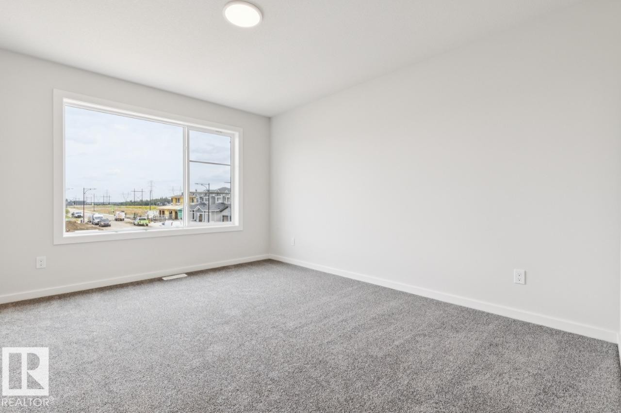2482 Egret Loop Nw, Edmonton, AB - Indoor Photo Showing Other Room