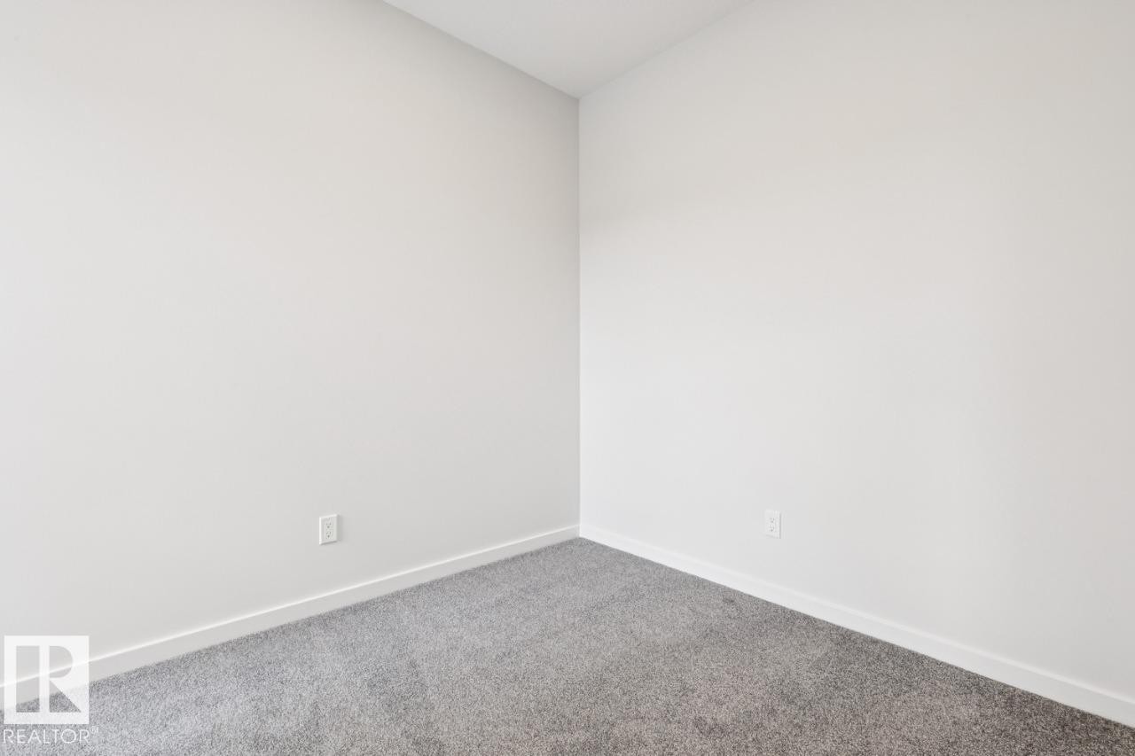 2482 Egret Loop Nw, Edmonton, AB - Indoor Photo Showing Other Room
