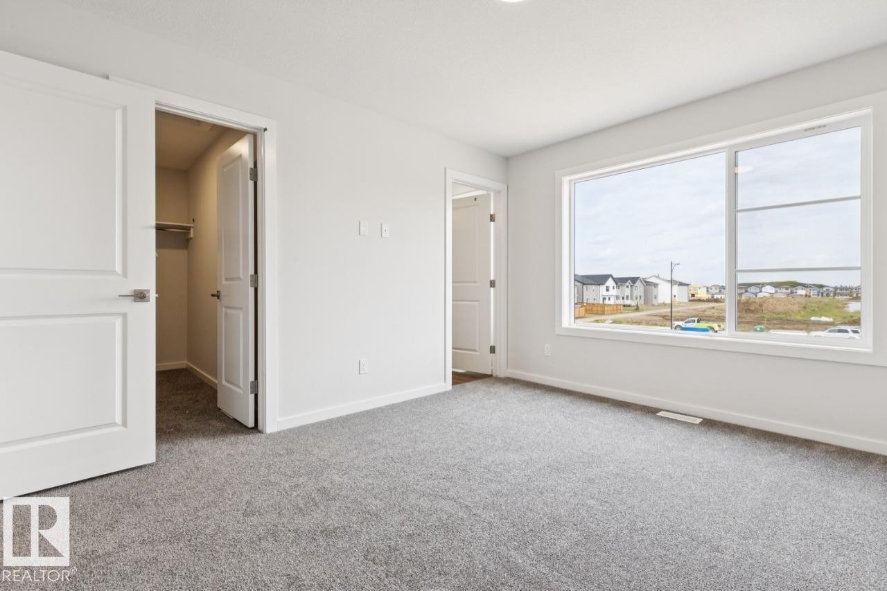2482 Egret Loop Nw, Edmonton, AB - Indoor Photo Showing Other Room